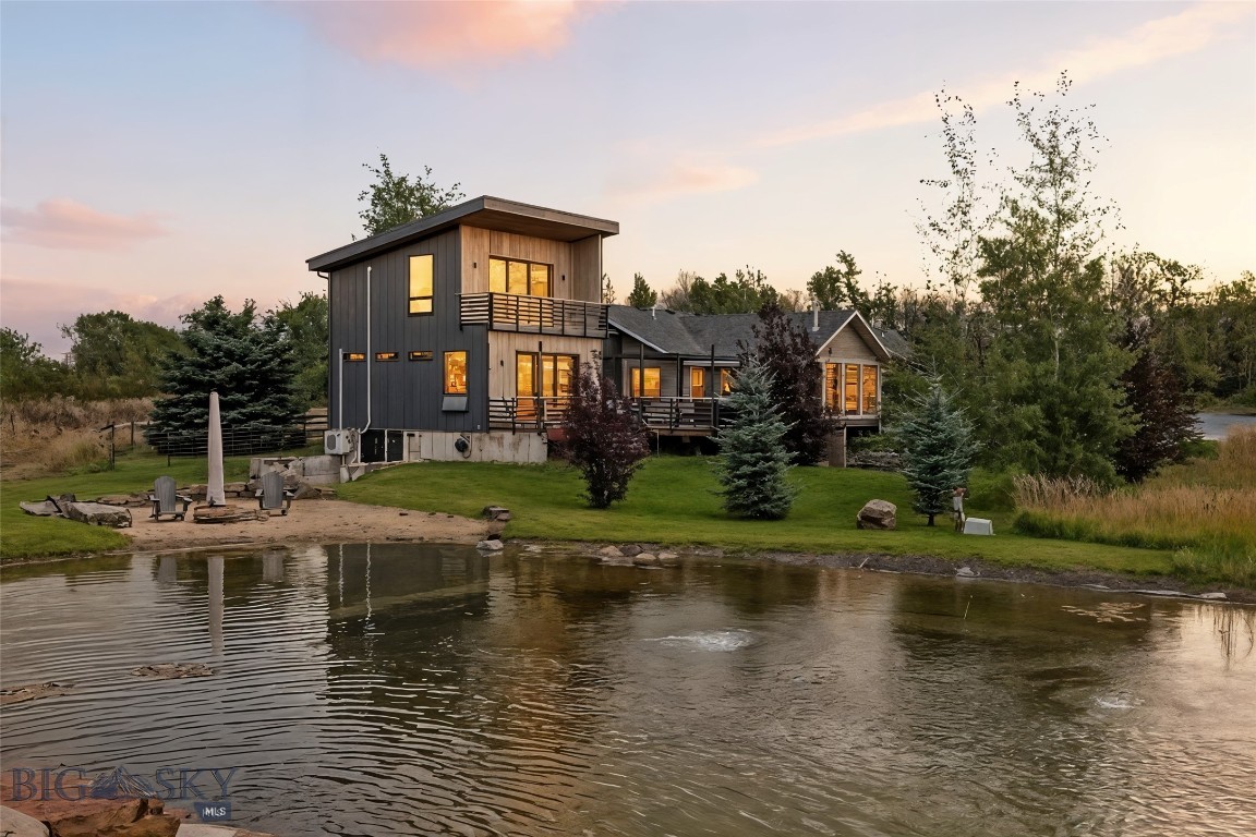 RARE FIND!  NO COVENANTS, NO HOA AND NO ZONING!  Five private acres at 9000 S 19th Ave, this stunning 6380 sq ft modern European style estate is a rare combination of natural serenity, expansive living, and exceptional versatility, all just 10 minutes from downtown Bozeman.  Nestled near Hyalite Lake, the Gallatin National Forest, and miles of scenic trails, the property is surrounded by Montana’s most inspiring landscapes and outdoor recreation in the Anderson School District.

The main residence features 2 spacious primary suites, additional guest bedroom, 3.5 baths, thoughtfully designed to embrace comfort, natural light, and breathtaking mountain views from nearly every vantage point. The home is perfectly positioned to overlook a beautifully landscaped, well-fed pond complete with a waterfall feature and sandy beach, creating a peaceful centerpiece that enhances the sense of tranquility throughout the property.  A modern Europen kitchen features Silestone cabinets, Blum Cabinet hardware, Stainless Bosch Appliances and built in Espresso Machine.   The main floor showcases European 3/4 solid white washed maple hardwood floors. 

Adding tremendous value and flexibility, the lower level includes a full two-bedroom apartment with a private entrance, ideal for extended family, guests, or long-term rental opportunities. A separate and stunning 1,200 sq ft ADU, currently operating as a successful Airbnb, further elevates the property’s strong passive income potential.

For those seeking space to create, work, or play, the property boasts an impressive 5,000 sq ft heated shop two separate bays, an office and a 15’ x 100’ lean-to, featuring a pickleball court and countless additional amenities—perfect for recreation, storage, or business use. 

Centrally located between Big Sky Resort and Bridger Bowl, and within close proximity to world-class skiing, fishing, hiking, biking, and public lands, this estate offers unmatched access to everything Gallatin County has to offer—while maintaining a profound sense of privacy and calm.

This is a true Montana sanctuary—a peaceful retreat, income-producing opportunity, and lifestyle property all in one.  Perfect for a corporate retreat or multigenerational living.  This property checks off all the boxes!  You truly have to see it to fully understand the possibilities!  Two many upgrades to list - see additional provision.

Crossposted as commercial also.  See mls 408397