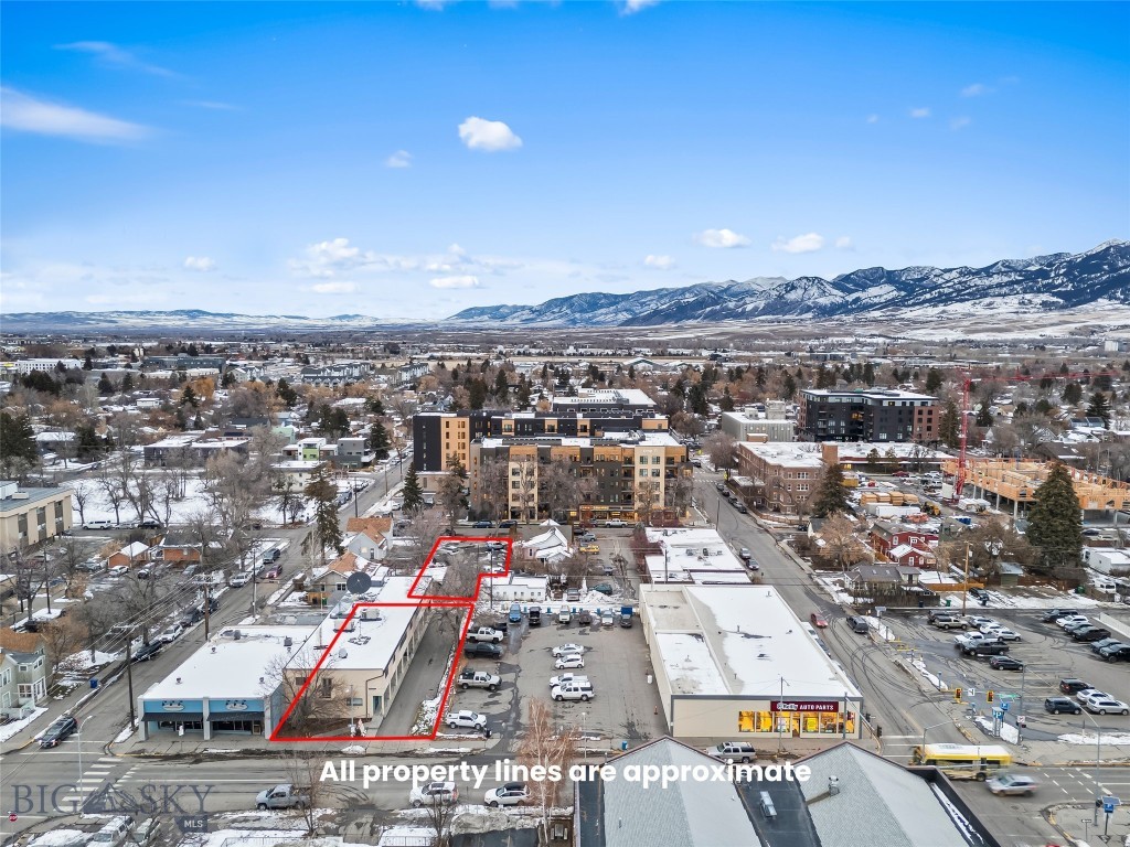 Prime Investment Opportunity in Downtown Bozeman.  Discover exceptional potential with this 14,000 sq ft commercial building located just one block off Main Street in the heart of Downtown Bozeman. The property features a paved parking lot—an increasingly rare asset in the downtown core—and a versatile interior layout.
The building is currently configured with multiple private offices, a reception area, and a conference room, offering flexibility for a wide range of professional or service-oriented uses. Its adaptable floor plan and premium location make it an ideal opportunity for investors, owner-users, or those seeking a strong candidate for redevelopment.
Position yourself in one of Bozeman’s most desirable commercial districts with a property that delivers both current utility and long-term potential.