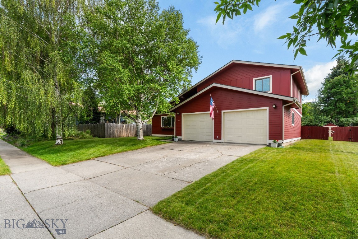 Located on Bozeman's desirable south side, this 3-bedroom, 2.5-bathroom home offers 1,948 square feet of comfortable living in the historic Figgins Additions neighborhood. The main level welcomes you with a living room, dining room, family room, kitchen, laundry room, and a half bath — a layout that flows easily for both everyday life and entertaining. The living room is the heart of the home, featuring a gas fireplace, vaulted ceiling, and floor-to-ceiling bookcases that create a striking focal point. Hardwood floors flow through the main living areas, complemented by generous closet space throughout. Two separate access points — from the dining room and the family room — make the backyard easy to enjoy, whether you're chasing kids, letting pets out, or simply stepping outside.

Upstairs, the three bedrooms and two full bathrooms provide privacy from the main living areas, with the convenience of having all bedrooms on one level. It's a layout that's ideal for a family looking to make use of multiple living spaces while keeping bedrooms together.

Outside, a deck extends the living space into the backyard, perfect for enjoying peaceful Montana evenings. Mature landscaping surrounds the front and back yards, and a sturdy storage shed keeps yard tools out of sight. The attached 2-car garage adds everyday convenience.

Set on a 9,713-square-foot lot just south of Kagy, this home offers quiet, established charm with the added benefit of a 5-minute walk to Morning Star Elementary and Sacajawea Middle School, and just 10 minutes on foot to Montana State University. Trail access is also just a short walk away, along with the Museum of the Rockies nearby. Downtown Bozeman is only a few minutes away, putting shopping, dining, and everything else the city has to offer within easy reach.

Contact us today to schedule a private showing.