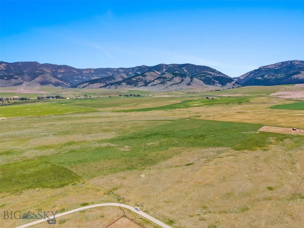 Discover the perfect balance of privacy, scenery, and convenience with this exceptional 20-acre parcel on Brown Pony Trail. Tucked away at the end of the road, this flat, fully fenced property offers breathtaking views of the Bridger Mountains while being surrounded by agricultural land, horse properties, and well-kept custom homes, creating the peaceful Montana setting you've been searching for. Electricity is available at the southeast corner of the property, making it even easier to bring your vision to life. With protective CCRs in place—but no HOA—you'll enjoy the freedom of country living while helping preserve the quality and character of the surrounding area.
Whether you're dreaming of a custom home, a place for horses, or simply room to spread out and enjoy Montana's wide-open spaces, this property offers an outstanding opportunity. Conveniently located just a short drive from Belgrade, Bozeman, Bozeman Yellowstone International Airport, world-class fishing, hiking, skiing, and countless outdoor recreation opportunities, this property delivers the best of Montana living. Seller will consider owner financing or a trade.