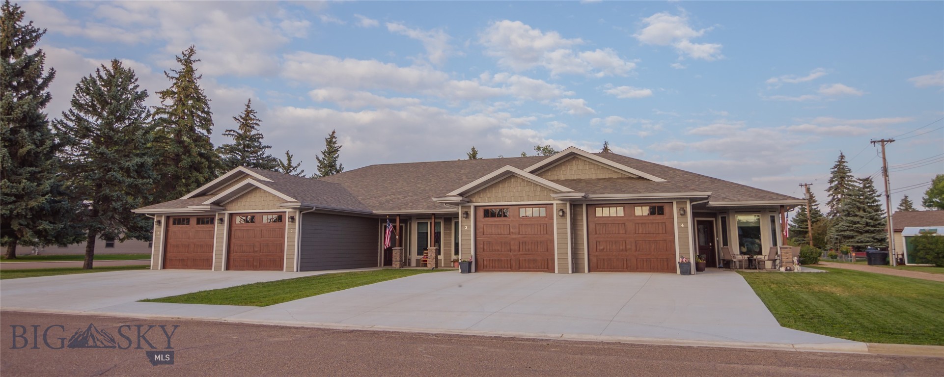 This stunning 4-plex offers a harmonious blend of modern comfort and practicality. Each of the four identical units boasts a generous 1104 square feet, featuring two bedrooms and two full baths. Enjoy the convenience of a front patio and a well-equipped kitchen with a dishwasher, washer, dryer, oven range, and refrigerator. The open floor plan creates a spacious ambiance, with huge kitchens and inviting dining and living room spaces. Construction was finished in 2022. With an oversize garage and a lot area of 0.482 acres, this 4-plex is an irresistible opportunity for investors or those seeking a multi-family living. There are also handicapped-accessible or barrier-free showers. There are 12 off-street parking spaces available. All outside doors have wheelchair-accessible thresholds. The garage doors measure 8' high by 10' wide. Info deemed reliable but not guaranteed. Buyer/buyer agent to verify.