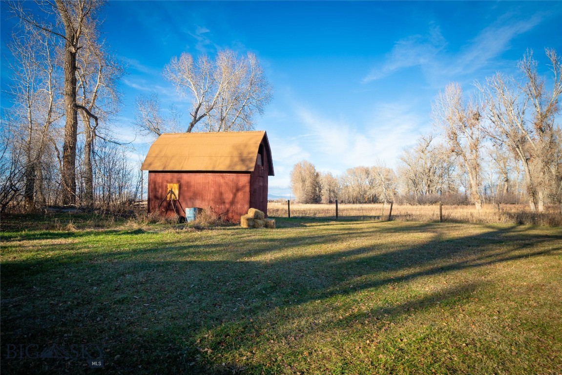 Discover an exceptional 2-acre property at 5044 Monforton School Road, perfectly positioned in the highly desirable Monforton School District. Surrounded by mature trees and a great view shed this rare offering provides both privacy and convenience with easy access to Bozeman, Four Corners and Big Sky corridor amenities. Zoned RR/A Subdistrict, the property allows for a wide range of uses by right, including single-family homes up to and including four-plexes—a valuable opportunity for future development or investment. Additional conditional uses may be possible with a CUP, offering even greater flexibility. Older accessory structures, along with a 1925 farmhouse, convey with the property and offer potential for renovation, storage or redevelopment. Whether you’re seeking a homesite, income-producing opportunity or long-term hold, this versatile acreage delivers exceptional potential in a prime location.