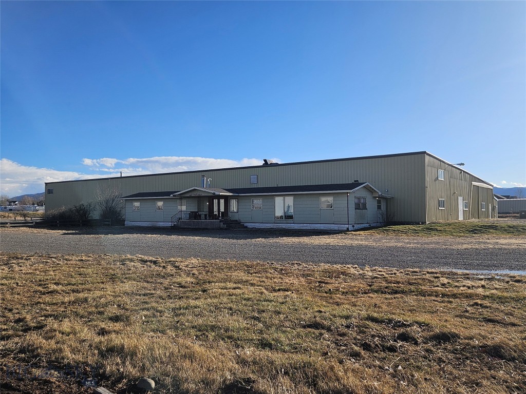 22,150 +/- SF Steel building on 4 Acres. The main building has 1200 AMPs of 3 Phase power, natural gas, and compressed air. There is no fire suppression currently, but can be added for an additional cost. There is also 2,150 SF office building and 20,000 SF steel building.  The property has several points of ingress/egress with additional driveways possible. This is a very convinient location between Bozeman and Big Sky, MT. Lease to own option also available.