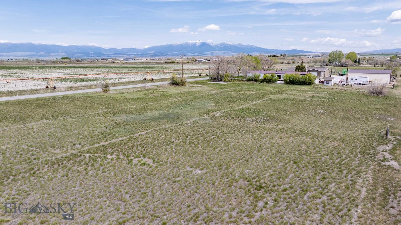 One-acre lot located at the edge of Townsend. This property offers a very convenient location in city limits near all local amenities while providing extra elbow room and a peaceful, rural feel.  The lot features great views and a quiet setting, making it an ideal building site. Schedule a showing today.