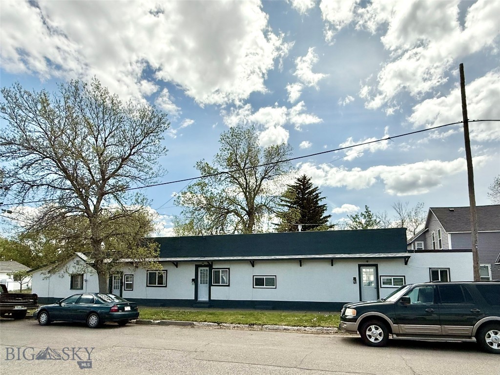 This triplex is conveniently located within Livingston's Central Business District just a block from Main Street. The well-maintained building has a consistent rental history. All units have laminate flooring throughout, electric heat and water heaters, newer exterior paint, range and refrigerator. There is an updated membrane roof over 2-inches of styrofoam insulation. Units 204 and 208 each have a small, fenced yard area. Unit 212 has a small outdoor area and 1-car detached garage. There is a wood privacy fence along the perimeter of the back of the property. Tenants must have 24-hours' notice prior to showing so keep this in mind when scheduling a showing with your Realtor. OWNER FINANCING ONLY - Down Payment amount and terms negotiable.