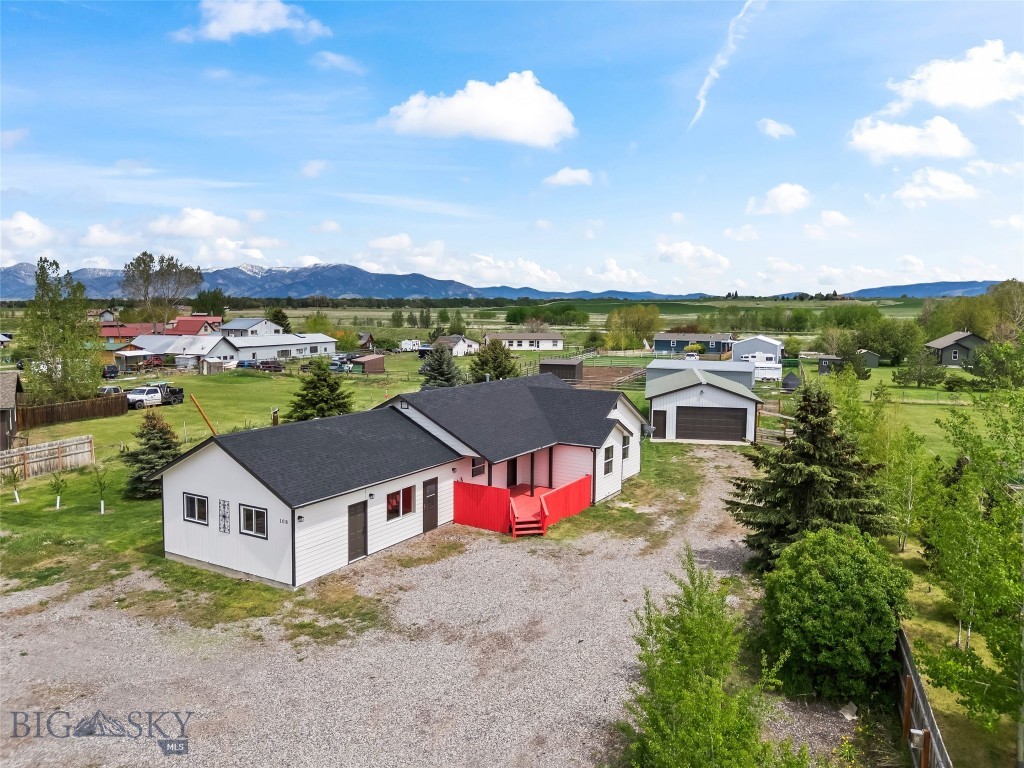 Welcome to 108 Violet Rd, where thoughtful renovation meets Montana living on nearly an acre with sweeping mountain views. This beautifully updated home has undergone an extensive interior transformation featuring a fully remodeled kitchen and bathrooms, along with refreshed finishes throughout the entire interior that create a bright, modern, and inviting atmosphere. The redesigned kitchen offers clean contemporary styling, updated cabinetry, and an open layout that flows seamlessly into the living spaces, while expansive windows frame the surrounding landscape and bring the outdoors in.

Outside, the property continues to impress with a spacious backyard shop offering exceptional flexibility for hobbies, storage, equipment, or workspace needs. Set on nearly one acre, the grounds provide room to spread out, entertain, garden, or simply enjoy the open Montana skies. With mountain views and a rare combination of updated interiors and usable outdoor space, this property delivers both comfort and lifestyle just minutes from downtown Bozeman.