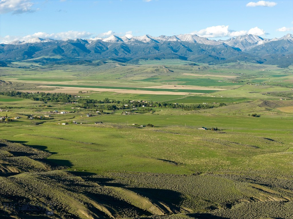Nestled in the heart of Shields Valley, Last Light Ranch is a stunning 160± acre property just a 1/2 mile southwest of Wilsall, Montana, with panoramic views of the Crazy Mountains to the East and Bridger Mountain Range to the West. Accessible year-round, with no covenants or deed restrictions, this fertile ground positions a new buyer to take full advantage of all it has to offer. Last Light Ranch boasts two developed springs that serve as an abundant water source to the land, nourishing its natural vegetation, all the while providing a place of rest and respite for livestock and wildlife, alike. Whitetail and mule deer, antelope and the occasional elk herd, as well as game fowl including Hungarian partridges are all known to frequent its rich landscape. For the fly-fishing enthusiast, the Shields River – plentiful in rainbow, cutthroat, brook and brown trout – is only a mile to the east and the famous Yellowstone River, only 20± miles south. The ranch’s convenient location allows for quick access to Wilsall, a charming western town, in addition to only being a 50±-minute drive to Bozeman, where world-class amenities abound, and a 30±-minute drive to Bridger Bowl Ski Area. With power available from Shy Road, properties like Last Light Ranch are few and far between.