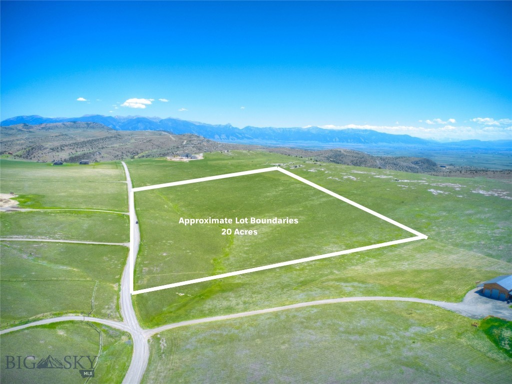 Discover your private Montana escape on this exceptional 20+ acre parcel in Gallatin River Ranch. Gently sloped and thoughtfully positioned, the property offers multiple ideal building sites to take full advantage of the surrounding landscape and expansive views of several mountain ranges. Tucked toward the back of the ranch, you’ll enjoy an added sense of privacy and seclusion.

Gallatin River Ranch is known for its unmatched amenities, with thousands of acres of common ground for hiking, horseback riding, and exploring the natural beauty of Big Sky Country. Property owners also enjoy exclusive access to over 2.5 miles of the Gallatin River, complete with a scenic walk-out picnic pavilion and fire pit—perfect for gathering, relaxing, or launching a day on the water. Whether it’s floating, fishing, or simply soaking in the setting, outdoor recreation is always within reach.

Horse enthusiasts will appreciate the flexibility of allowing up to four large animals per parcel and miles of riding trails. Explore the options provided by the neighborhood's world-class equestrian and boarding facility. 

All of this, just 20 minutes away from the Bozeman Yellowstone International Airport and approximately 30 minutes from downtown Bozeman, offering convenient access to dining, shopping, and entertainment—while still enjoying the peace and quiet of your own Montana retreat.