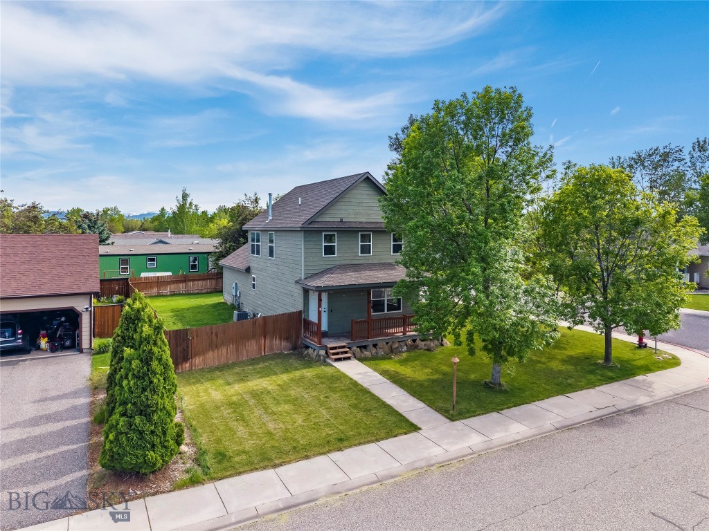 Welcome to 618 N River Rock Drive. Perfectly positioned on a spacious corner lot in the River Rock Subdivision, this 3-bedroom, 2.5-bathroom home offers the perfect blend of comfort and easy living. Built in 2004, this inviting residence features 1,980 square feet of total living space situated on a level 6,490 square foot lot. The main and upper levels provide 1,320 square feet of bright and functional space, kept comfortable year-round by central air conditioning and forced air gas heating. Downstairs, the 660-square-foot finished basement expands your living options significantly. This versatile lower level includes a spacious family room or dedicated den/office, storage space, a laundry room, and egress windows that ensure safety while letting in natural light. Outdoor living is a breeze with two porches and a fully fenced backyard---perfect for entertaining or enjoying quiet Montana evenings. The property also features a convenient 2-car attached garage for your vehicles and outdoor gear. Living in the River Rock Subdivision means enjoying an incredible array of community amenities right outside your door, including a stocked trout pond, scenic walking trails, and the River Rock Community Center. You are perfectly positioned just moments away from downtown Belgrade, local parks, and the Bozeman Yellowstone International Airport, while maintaining an easy 15-minute commute to Bozeman. You may also appreciate the location within the Belgrade School District, where neighborhood students typically attend the highly acclaimed Ridgeview Elementary.
