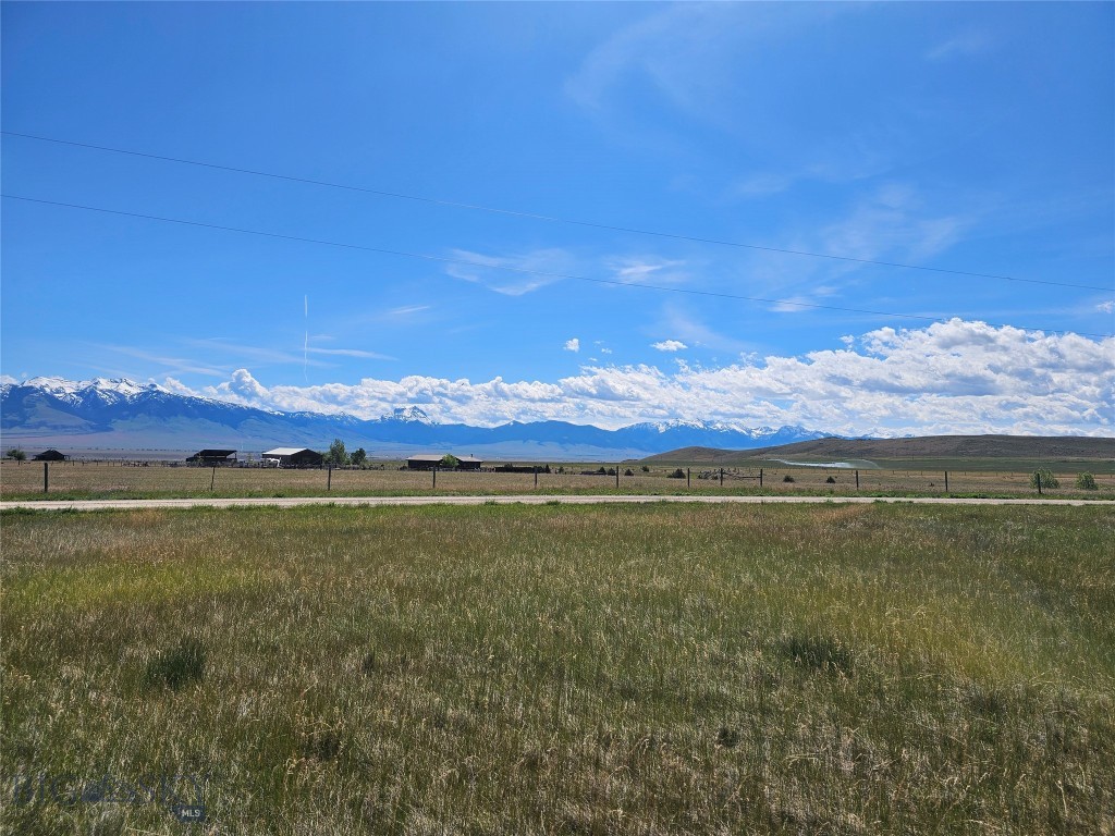 Discover the perfect opportunity to own 5 acres in the beautiful Shining Mountains subdivision, offering the ideal balance of privacy, recreation, and convenience. With power available nearby and multiple potential building sites, this property is ready for your Montana dream home, cabin, or weekend retreat. Enjoy private access to Haypress Lakes, stocked with trout, and spend your days fishing the world-renowned Madison River just minutes away at Varney Bridge Fishing Access. Surrounded by expansive public lands and endless opportunities for hiking, horseback riding, hunting, fishing, and ATV adventures, this property is the perfect place to experience the Montana lifestyle. Make your Montana dream a reality today.