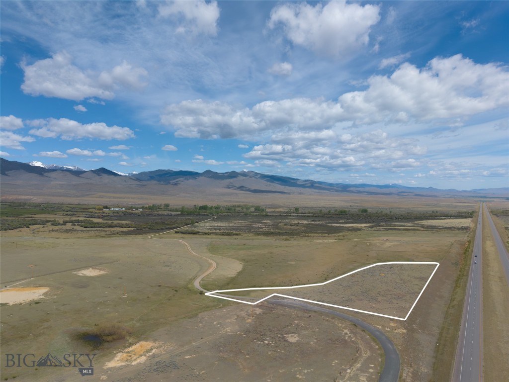 Take in sweeping mountain vistas and endless Big Sky views from this 4.86-acre parcel located just 15 miles north of Dillon, Montana. With convenient access directly from the Interstate 15 frontage road, this property offers ease of year round access. Located just moments from the Birch Creek recreation area, you’ll enjoy a multitude of  outdoor adventures right at your fingertips—whether it’s hiking, fishing, or exploring the great outdoors. With no covenants in place, you have the freedom to bring your vision to life on your terms. The lot is DEQ-approved and ready for you to begin construction. If you’re searching for space, stunning scenery, and convenience of access, this property delivers. Call today to learn more or to schedule your showing!