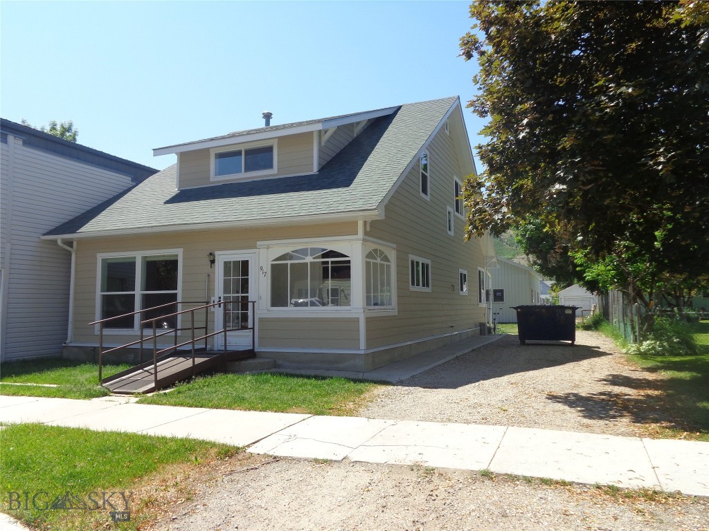Large one and one-half story eastside residence with four bedrooms, one bathroom, main floor laundry and partial basement.  Features include upgraded exterior, two enclosed porches, hot water heat, landscaped yard with sprinklers and fencing and large metal garage and shop.