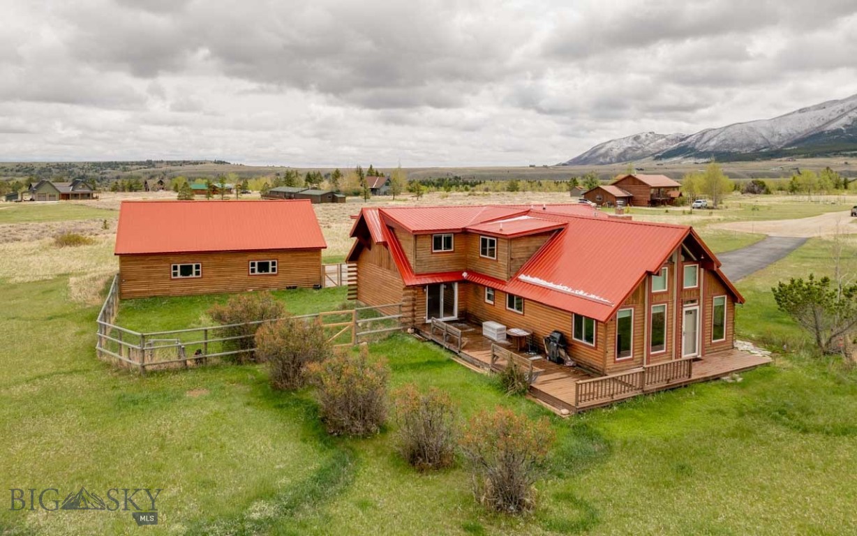 Mountain living meets adventure in Tipi Village! Close to Red Lodge Mountain and all of the spectacular recreation the West Fork of Rock Creek has to offer. This home is situated on 2.2 acres with mountain views and has 5 bedrooms and 3 bathrooms. The home features a 36x42 shop built in 2003. The spacious primary suite is located on the upper level and has a balcony, gas fireplace and sauna.