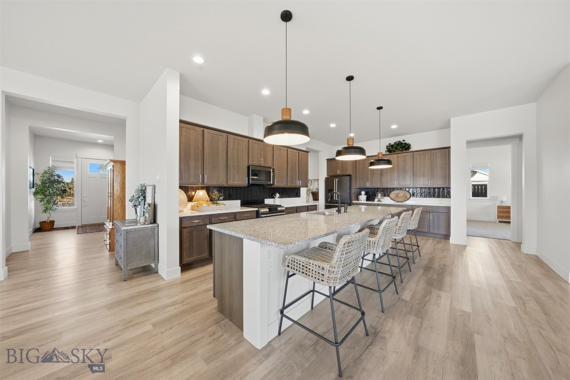 Tucked at the end of a quiet cul-de-sac on a dead-end street in Prescott Ranch, this 2021 Craftsman offers 2,825 sq ft of single-level living with a smart, privacy-forward layout. The open-concept living, dining, and kitchen area is bright and welcoming, anchored by a gas fireplace and designed for easy entertaining. The kitchen delivers with a gas range, Café appliances, reverse osmosis to the sink and refrigerator, and ample prep space for everyday living.

The oversized owner’s suite is positioned to overlook the backyard and feels like a true retreat, featuring a stunning bathroom and a generous walk-in closet. At the front of the home, a junior suite provides ideal separation for guests or multi-generational living. A third bedroom sits adjacent to a full bathroom with a shower, creating a flexible setup for an office, home gym, or additional guests.

Outside, enjoy a covered patio with a hot tub hookup and a gas stub ready for a grill, plus lawn, underground sprinklers, partial fencing, and mountain views. Additional highlights include central A/C, forced-air gas heat, and a 3-car attached garage. Neighborhood amenities include parks, a playground, and sidewalks. A small one-way side lane runs behind the property.