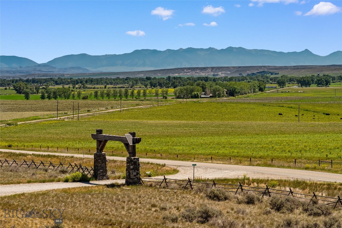 Discover over 7 acres of Montana beauty in Highlander Park, ideally located between Three Forks and Bozeman. This exceptional parcel offers sweeping views of the Bridger, Tobacco Root, and surrounding mountain ranges, along with multiple attractive building sites to capture the scenery and wide-open skies. Overlooking expansive farmland and situated near the Jefferson River, the property combines privacy, space, and convenience with easy access to I-90. Light covenants help protect property values while providing flexibility, and there is currently no active HOA. Seller recently obtained a well and septic permit, buyer to install. Whether you're planning your dream home, horse property, or Montana retreat, this is a rare opportunity in one of the area's most desirable rural communities.