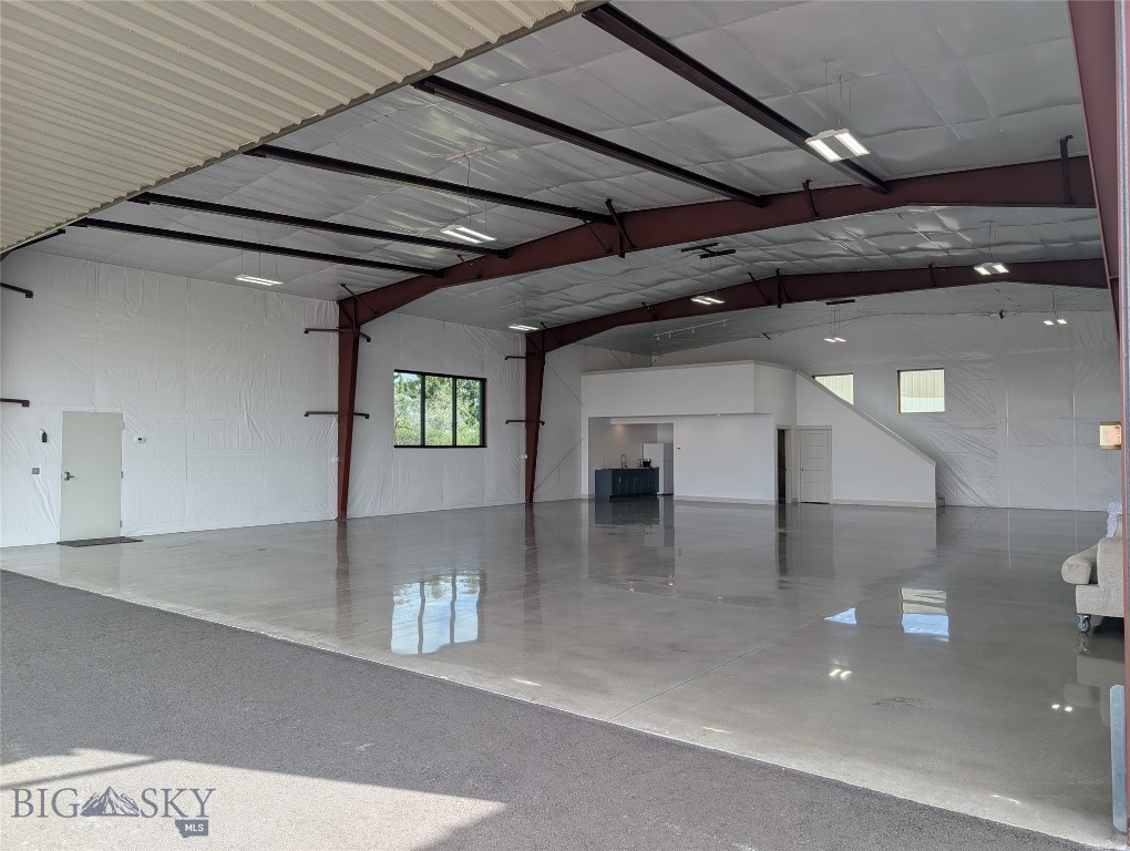 Tired of hangar rash and fighting for ramp space? Secure your spot at Bozeman Yellowstone International (KBZN) in a hangar so nice, you’ll be tempted to move in—and with a custom kitchen and tiled shower, you could theoretically live there—if it were permitted!

This 50x65 masterpiece features 16' sidewalls and a 46' x 13'4" bifold door that opens to an end-of-taxiway location with an unusually large apron (perfect for parking all your other "expensive hobbies"). Inside, it’s all creature comforts: radiant floor heat, Energy Star insulation, exotic granite, and a 235sf mezzanine for your office or "pre-flight" nap zone. Whether you need a fortress for your aircraft or an investment that’s in higher demand than a tailwind on a cross-country, this is it. Don't let this one depart without you.
