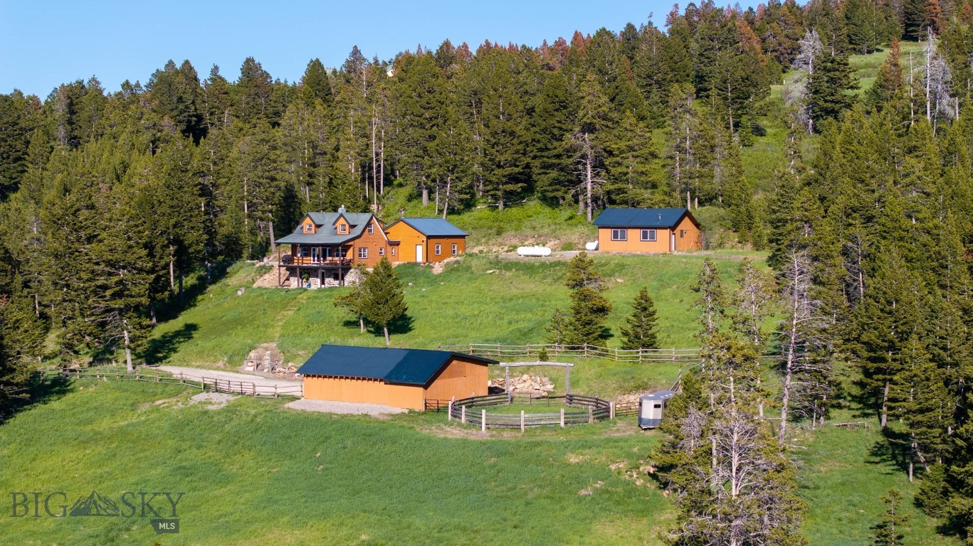 This is the Montana Experience! Looking for a place that will enhance your outdoor lifestyle?  This is it!  And the views alone are like nothing else!  On 24.26 gorgeous acres with sweeping views of the Bridger Mountains and the emerald, green valleys in between; this little oasis is calling your name. This outstanding property boasts a tastefully updated home with a newly built attached and heated 2 car garage, plus an additional 1 car detached heated shop (667 sq ft) with plenty of space to work on projects or park all your recreational vehicles! There is a sizable barn with shelter for your animals and room for hay storage; attached round pen and fully fenced pasture for your horses. Enjoy riding your horses on your land or to visit with your neighbors, the surroundings could not be more breathtaking. 100s of acres of state land nearby, the opportunities are endless; this is the Montana lifestyle. Timberline Creek includes 17 miles of privately maintained graded gravel roads which makes it nice for riding off road vehicles too.  The spring fed pond brings year-round enjoyment as wildlife like Moose, Bear and Elk pass through and enjoy swimming and lounging in the pond; you won’t find that type of experience in town. The fabulous expansive deck at the house allows you to sit and take in all that this amazing scenery has to offer; every day will bring something new across your beautiful landscape, you can just sit back and enjoy! And the home is fully furnished; move in and immediately enjoy your Montana dream home! You don't need to bring a thing.  This would make an ideal lock and leave home if you only plan on living in Montana half the year.  There are so many things to love about this property.  This home has had thoughtful, regular maintenance and the pride of ownership is evident around every corner.  You must see this home to truly appreciate this little piece of paradise and all that it offers.