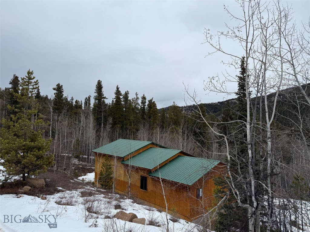 Sportsman's Paradise! Looking for a mountain property with Forest Service access out your back door? This is it!! With Nearly 20 acres of deeded Meadows, Timber, and Mountain Views, this spot will have you Dreaming of nights around the campfire beneath the stars. Walking around this neck of the woods you will find a fresh water spring on site, and mountainsides that offer vistas and vantage points all around. The property offers new owners the opportunity to make this Montana Mountain Getaway your own, with over 1,100 square feet of unfinished space. Ski Cabin? Why Not!? Showdown ski area is just 20 minutes to the south, this location truly has something for everyone. Come experience Peace & Quiet in the Mountains in Montana.