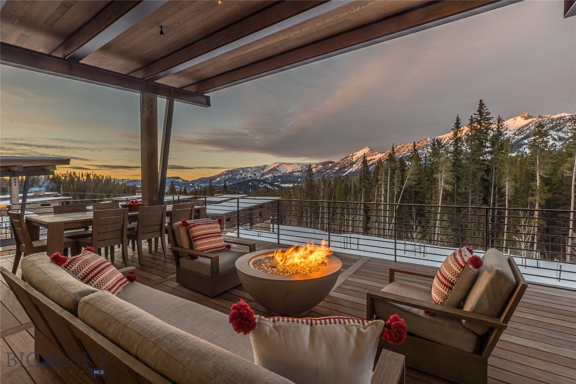 Framed by sweeping views of the Spanish Peaks and set within Moonlight Basin’s coveted Jack Creek Cabin community, 16 Speedwell Drive presents a rare opportunity to own a refined alpine retreat with convenient access to world-class skiing at Big Sky Resort and the private amenities of the Moonlight Basin Club.

Designed by the acclaimed Reid Smith Architects, this contemporary mountain home features timeless mountain modern interiors that balance warmth and sophistication through natural materials and thoughtful detailing. One of only 13 Jack Creek Cabins, the residence offers an exceptional blend of privacy and connectivity, with convenient access to Moonlight Basin’s private trail system, LakeLodge, One&Only Moonlight Basin, expansive ski terrain at Big Sky Resort, dining, and year-round recreation.

The interior is equally compelling, anchored by a well-considered floor plan that includes a two-car garage and dedicated mudroom, ideally suited for mountain living. The gourmet kitchen is appointed with Sub-Zero refrigeration, a Wolf range, and elevated finishes, creating a refined yet inviting space for gathering and entertaining. Expansive windows frame the surrounding peaks while filling the home with natural light throughout the day.

Offered furnished for immediate enjoyment, the residence is complemented by the opportunity for membership in the Moonlight Basin Club, providing access to the private Jack Nicklaus–designed golf course, dining, fitness, lake amenities, and a thoughtfully curated year-round outdoor lifestyle.

At 16 Speedwell Drive, architectural refinement and an exceptional alpine setting establish a residence of lasting distinction within Moonlight Basin.