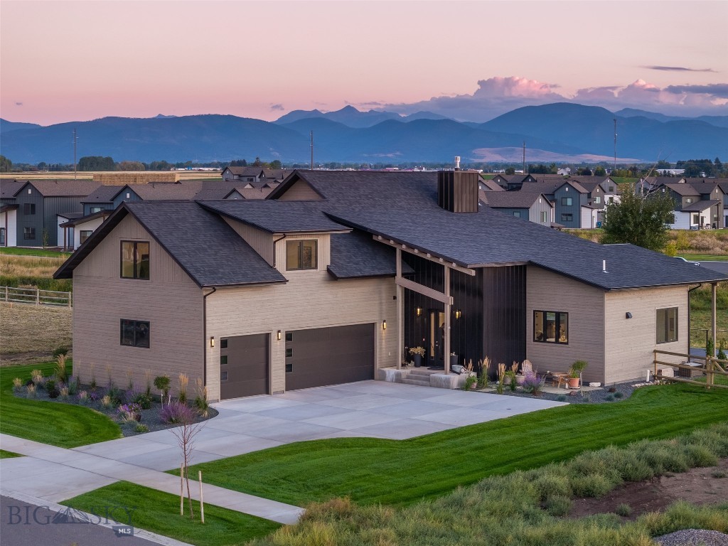 Some homes ask you choose between luxury and location. This home built in 2024 refuses to comprise. Set high above the fairways of Black Bull golf course and pointed at the stunning peaks of the Spanish Peaks mountains, this White Horse subdivision master piece is sure to please. This custom home by Radick and Company and Lyric Architects combines the stunning placement and functional layout for a true retreat. With just over 1/3 of an acre, this 3157+/- sq ft home offers 5 bed rooms, 4 baths, and an abundance of light. With vaulted ceilings and south facing views the home offers an indoor outdoor lifestyle with a 685+/- sq ft deck. The main level offers over 1900+/- sq ft with the primary bedroom and a second bedroom/office. This home offers so many upgrades throughout from GE Cafe appliances, waterfall countertops, toe kick under cab kitchen and primary bath lighting, microwave drawer, floating shelves, Marvin windows and doors, custom interior metal handrails, remote blinds package, and hot tub. The upper level features two bedrooms and third bedroom or bonus room. The home is complete with a complete solar package, AC, 3 car 930 +/- sq ft heated garage, fenced yard, and custom dog wash.