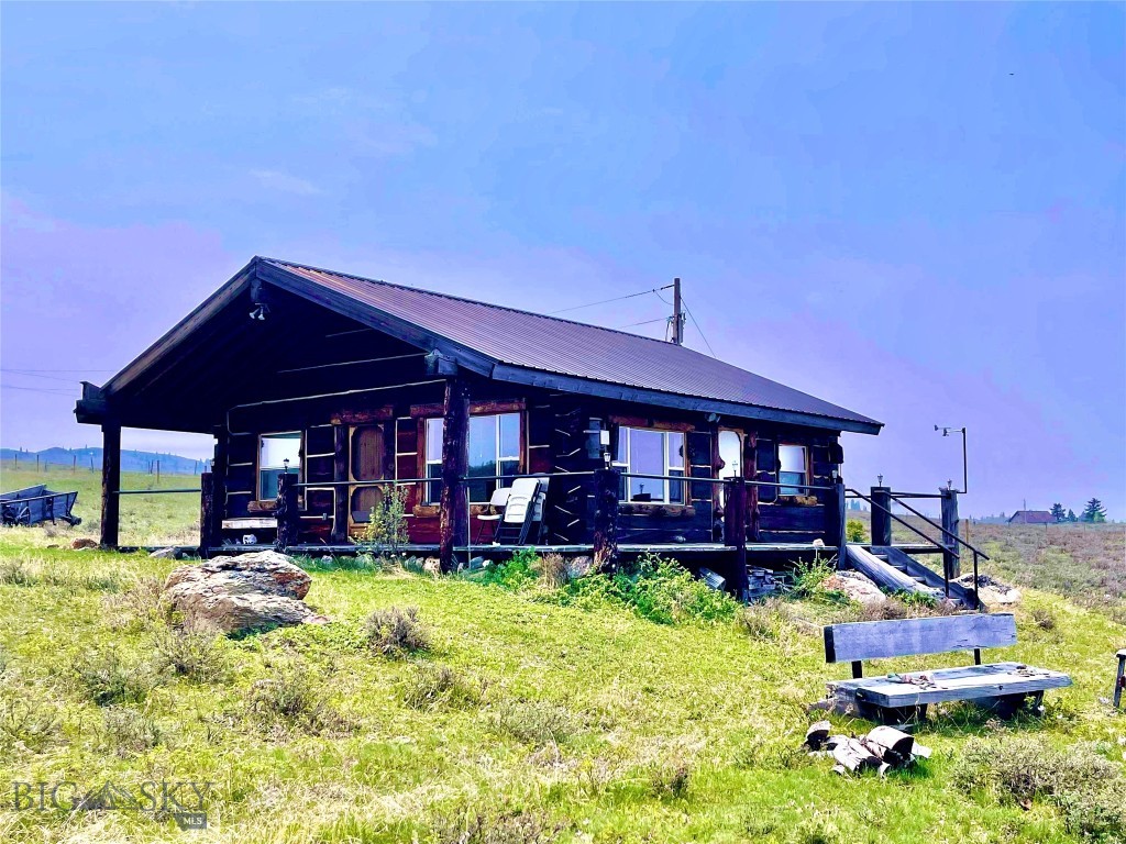 Set along the shoreline of renowned Duck Lake near Babb, Montana, this charming 756 sq. ft. log cabin is the kind of Montana retreat people dream about—warm, rustic, and perfectly placed just minutes from Glacier National Park. Inside, you’ll find 2 bedrooms, 1 bath, and a sleeping loft, with rich wood finishes and a cozy woodstove that makes every season feel inviting. Mornings start with coffee by the water, and evenings end with the lake softly lapping at the shore and views of Chief Mountain, mighty and majestic. Additionally, this cabin is an active, successful Airbnb offering buyers a rare opportunity to enjoy a personal getaway while tapping into strong short-term rental demand in one of Montana’s most sought-after recreation corridors.