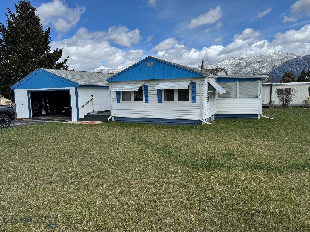 1300 Sunrise Lane features a well-maintained mobile home offering 3 bedrooms and 1 full bathroom on a spacious 9,104 sq ft corner lot. The property includes a double-car garage and additional off-street parking. Numerous upgrades have been completed, including added insulation and several newer windows, enhancing comfort and efficiency. Conveniently located just minutes from local amenities, this home provides the benefit of accessibility while maintaining a quiet, outskirts-of-town feel.