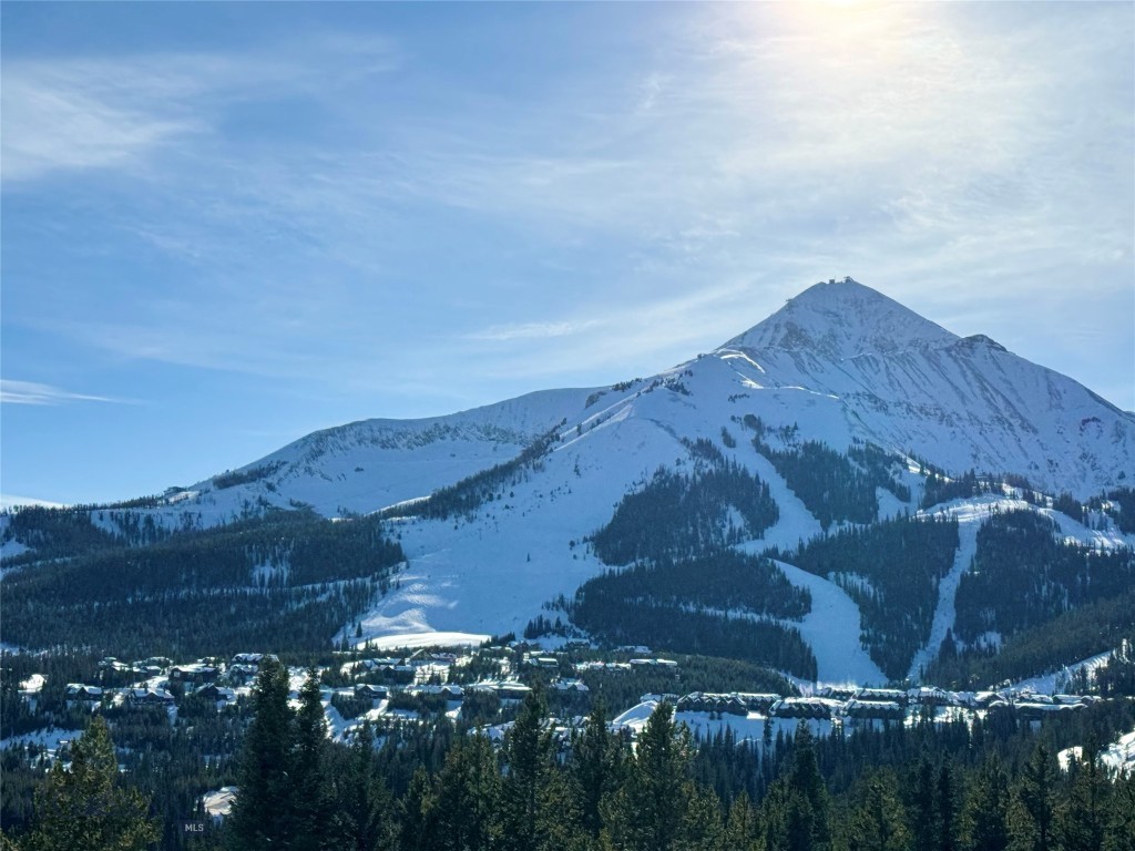AMAZING LOT IN THE CASADE SUBDIVISION, SKI- IN- OUT, SOUTHERN EXPOSURE. ENGINEERING, HOUSE PLANS ALREADY IN PLACE.
This 1.01-acre forested home site is located on Middle Rider, overlooking Big Sky Mountain Village.  Cascade Subdivision combines incredible mountain vistas and convenient location.  You are just minutes from the Greatest Skiing in America on the slopes of Lone Mountain, Lake Levinsky and endless outdoor recreation opportunities:  World-class hiking, biking, skiing, golfing, fly fishing, climbing, rafting, and other mountain sports which are easily accessible.
One of the most desirable locations in Montana awaits a dream home…yours!