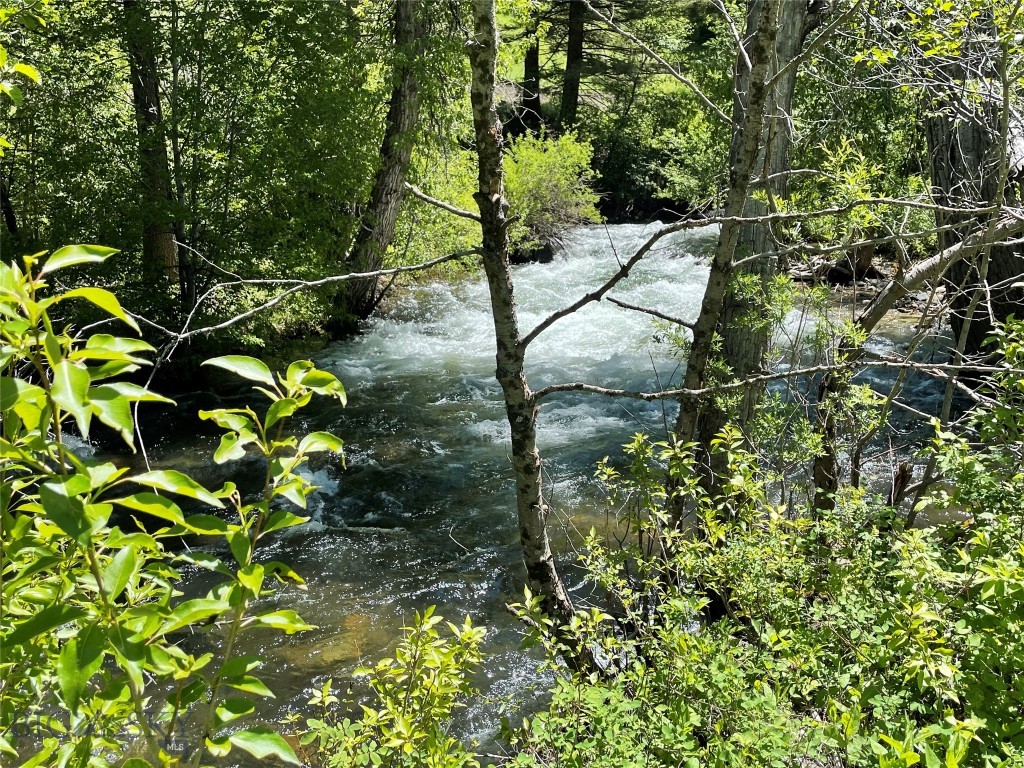 Discover this private 7.31 acres along the South Boulder River—an ideal spot for your dream home or getaway cabin. Wake up to the soothing sounds of the river and breathtaking views of Montana’s natural landscape. With power nearby, this property is ready for your vision. Step out your door to fish in the river, or explore the surrounding terrain by foot, horseback, or ATV. Conveniently located with easy access to I-90 and just an hour from Bozeman. Owner financing may be available—don't miss this opportunity!