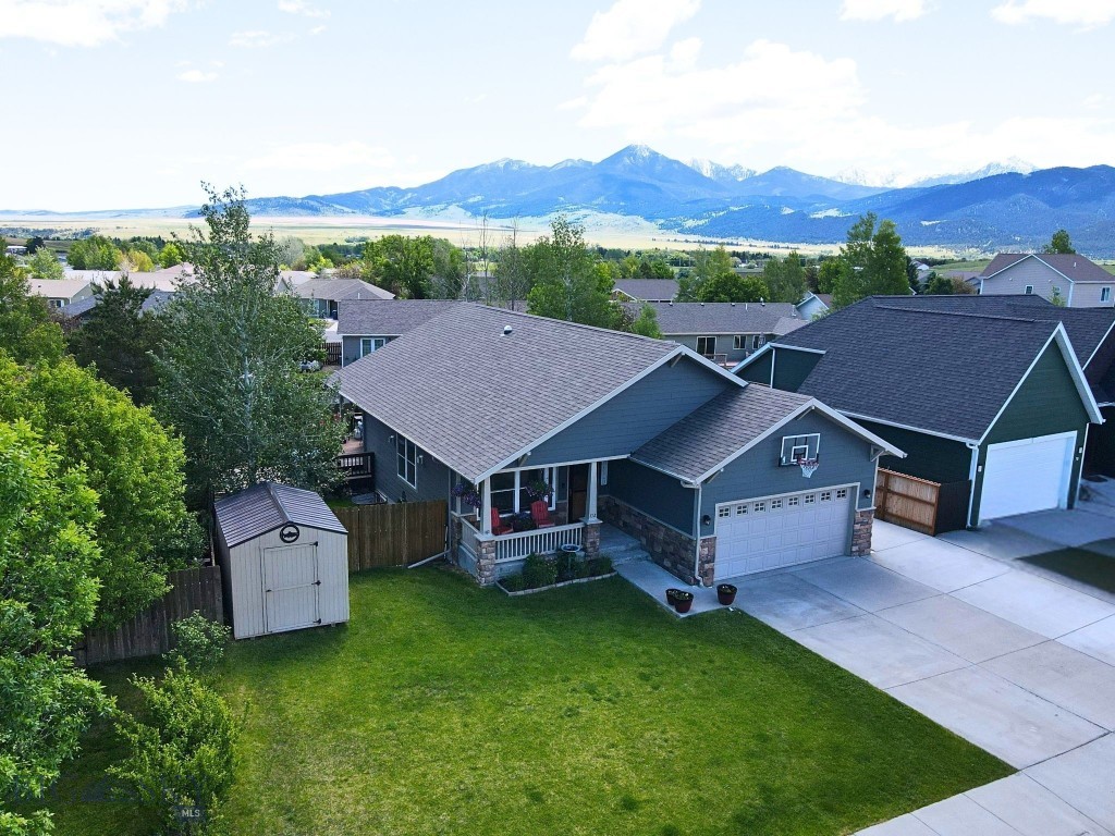 New Pictures! Spacious, flexible, and thoughtfully updated, this home offers room to grow, gather, and enjoy Montana living. With 5 bedrooms, 3 full baths, and a dedicated office, it provides the versatility you might be looking for!

The main level features comfortable living and dining spaces with a cozy torch gas fireplaces, creating a warm and inviting atmosphere year-round. The kitchen is well-equipped with granite countertops, a gas range, and plenty of space for cooking and entertaining.

The recently remodeled, fully finished basement expands the home's functionality with additional bedrooms, a full bath, a comfortable family room, and office space—ideal for guests, remote work, hobbies, or multi-generational living. Egress windows throughout provide natural light and peace of mind.

Pride of ownership is evident throughout with recent interior and exterior paint, central air conditioning, and thoughtful updates that make this home move-in ready.

Outside, enjoy the covered back porch overlooking a fully fenced backyard complete with raised garden beds and room to relax, play, or entertain. Located on Livingston's desirable north side, you'll be just a short walk from parks, baseball fields, and the Fleshman Creek trail system.

With easy access to Bozeman, Yellowstone National Park, world-class fishing, skiing, and endless outdoor recreation, this home offers the perfect balance of small-town charm and Montana adventure.

Schedule your showing today and see everything this well-maintained Livingston home has to offer!