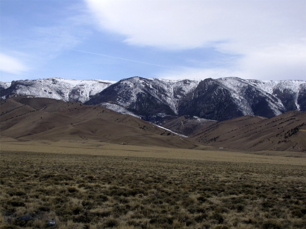 20 acres under the Big Sky of Montana! 20 acres just off of Robertson Draw road at the foot of the Beartooth Mountains, this property offers expansive views of the Beartooth Mountains and is only a mile from the National Forest! Located on the flanks of the Beartooth Mountains, it is a great location for your cabin where you can watch the sunrise and sunsets far from the city lights. The views surround you... the Beartooth Mountains to the west, Heart mountain and the Absarokas to the south and the Bighorns and Pryors to the east across the Clark's Fork of the Yellowstone River Valley! Hwy 72 is 9 miles to the east & Belfry 17 miles to the north. Some folks live in the area year-round, but the county only maintains Robertson Draw road as a low priority, so snow plowing may be needed in the winter or patience waiting for the county to arrive. Power & phone are over 4 miles away, but lots of sun for solar! Wildlife in the area includes antelope, elk, deer, bears, grizzlies, wolves & sage grouse, while higher up moose, mountain goats and bighorn sheep. Mild covenants, but no HOA. Additional 39.8 acres is available to the north for a total of 59.8 Acres!