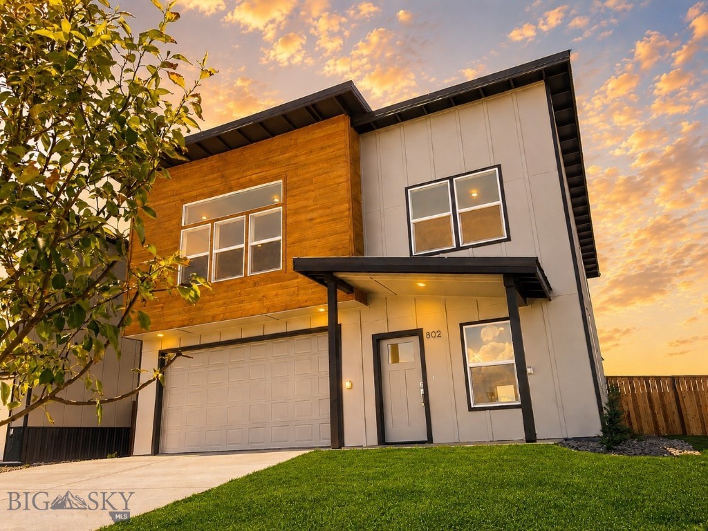 BUY DOWN TO 3.875% FHA 3 YEAR ARM BEING OFFERED WITH SELLERS PREFERRED LENDER SEE AGENT FOR DETAILS VALID FOR CONTRACTS WRITTEN BY 6/20/2026. COMPLETED AND READY FOR MOVE-IN! Spectacular corner lot with protected Bridger Views only 4 minutes to the new Rosauers and 8 minutes to Pickleball at The Picklr! Brand new 4/2 1/2 home with luxury finishes throughout and metal roofing! As you enter this home you are greeting by a large foyer and mud room area. Elegant high end luxury vinyl plank graces the floors, solid wood cabinets adorned by Calacatta waterfall countertops. Island seats 4 and overlooks OPEN dining & living room w/fireplace, covered porch and back yard in view. Fully outfitted with fenced yard, backyard irrigation and landscaping and air conditioning. Master suite upstairs has large transom windows and views of the Bridger range along with the other bedrooms. There also is a HUGE loft perfect for an office or a second living room with TV/workout etc.  Garage is heated and cooled and with epoxy floors so could be used as bonus room/game room. Come see this one of a kind modern home close to everything and south of the interstate bordering Bozeman! No traffic issues only 15 minutes to Main Street Bozeman and 16 minutes to MSU!
Interior Upgrades: Solid Surface Luxury Vinyl Plank flooring $8,000,Upgraded Wood cabinetry $5,000,Quartz countertops $10,000,Waterfall Quartz Island $3,000,Fireplace $4,000,Refrigerator $1,500,Air Conditioning $9,000 >>>Heated and air conditioned garage could be used as bonus room/man cave with epoxy floors. EXTERIOR UPGRADES: Metal standing seam roof $10,000,Slab construction (no crawl space) $12,000,Fenced Yard $15,000,Sod in backyard $9,000,Sprinkler system $6,000