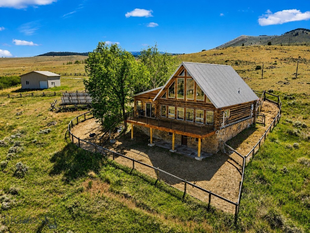 Beautifully renovated Montana log home on 5.479 acres in Virginia City Ranches, offering the perfect blend of rustic character, modern updates, and convenient access to some of Southwest Montana's most sought-after recreational destinations. Located just minutes from Downtown Ennis and a short drive to historic Virginia City, this 4-bedroom, 3.5-bath residence provides an exceptional opportunity to enjoy mountain living surrounded by breathtaking scenery, abundant wildlife, and endless outdoor adventure. Ideally positioned near the Madison River, Ennis lake, and thousands of acres of public land, this property offers easy access to world-class fly fishing, hunting, hiking, horseback riding, ATV trails, snowmobiling, and year-round recreation. Whether you're seeking a primary residence, seasonal retreat, or mountain getaway, this turnkey property delivers privacy, comfort, and the authentic Montana lifestyle in one of Madison County's most desirable recreational communities.