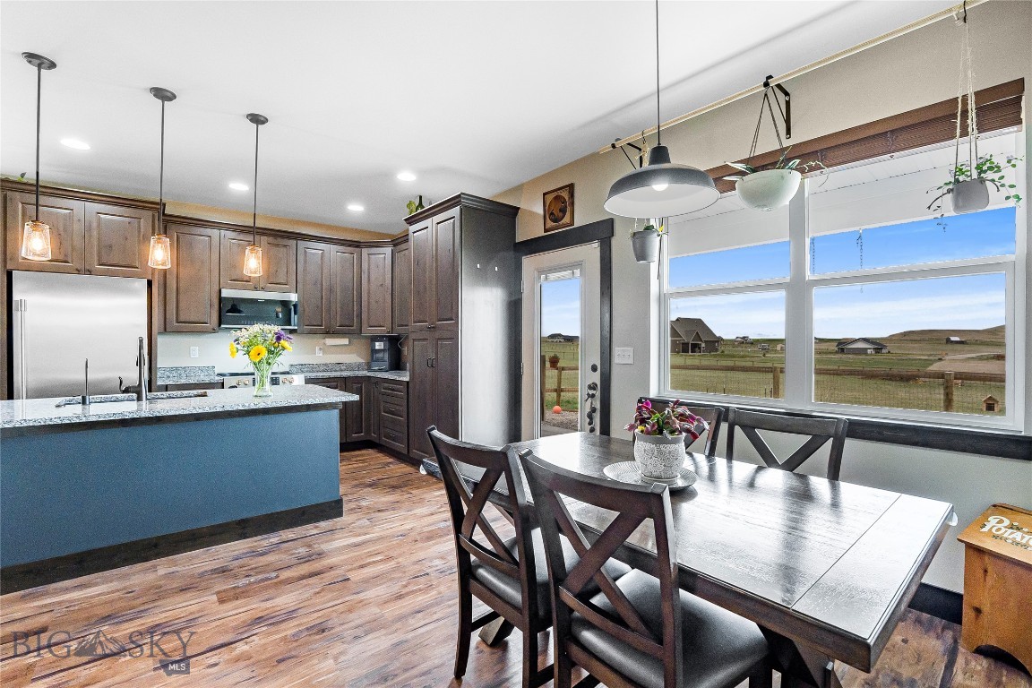 10 Amber Way offers the perfect blend of comfort, space, and Montana views on 3.007 acres just outside of Three Forks. Built in 2022 and very well maintained, this 2,043 square foot home features 4 bedrooms, 2.5 bathrooms, and a functional layout designed for both everyday living and entertaining.

As you enter the home, the main living area opens into a spacious living room, dining area, and kitchen with a gas fireplace. The kitchen and dining area flow easily to the covered back porch, complete with a propane hookup for your BBQ.

The main floor primary suite offers a comfortable retreat with a large ensuite bathroom and walk-in closet. Upstairs, you’ll find three additional bedrooms and a full bathroom, providing flexibility for guests, family, or office space.

Additional features include central A/C, forced air heat, whole-home humidifier, R/O water filtration system, Cat5 cable wiring, window treatments, and a 1,000-gallon buried propane tank. The fully insulated 3-car garage provides excellent storage and workspace options.

Outside, the smaller fenced patio area is fenced separately from the perimeter fencing of the property. Within the perimeter fencing, you'll find planter troughs and a chicken coop. Located about a half mile from Wheatland Road, this property offers privacy, room to spread out, and beautiful views while still being conveniently accessible.

An added benefit to this property is the potential opportunity to assume the existing loan with an interest rate of 3.625%, subject to lender approval and buyer qualification. Assumption terms, eligibility requirements, and transfer conditions may apply. Buyers are encouraged to contact their agent for additional details and to verify all information independently. *Video & Audio Surveillance at Property*