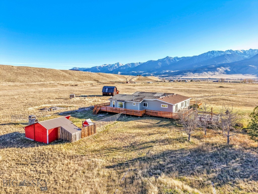 Home with Apartment on 16 Acres in Paradise Valley, Montana.  Enjoy big Montana skies and country living in this completely remodeled home on 16 acres in Paradise Valley. The main house offers an easy, comfortable layout with plenty of natural light and space to gather, while the separate apartment is perfect for guests, family, rental income, or your Mother-In-Law.  Plenty of room to garden, raise animals, or just kick back and enjoy the open space. Conveniently located between Livingston and Yellowstone National Park, this property gives panoramic mountain views with easy access to all the best local spots — from fishing on the Yellowstone River to dinner at Sage Lodge and a soak at Chico Hot Springs.