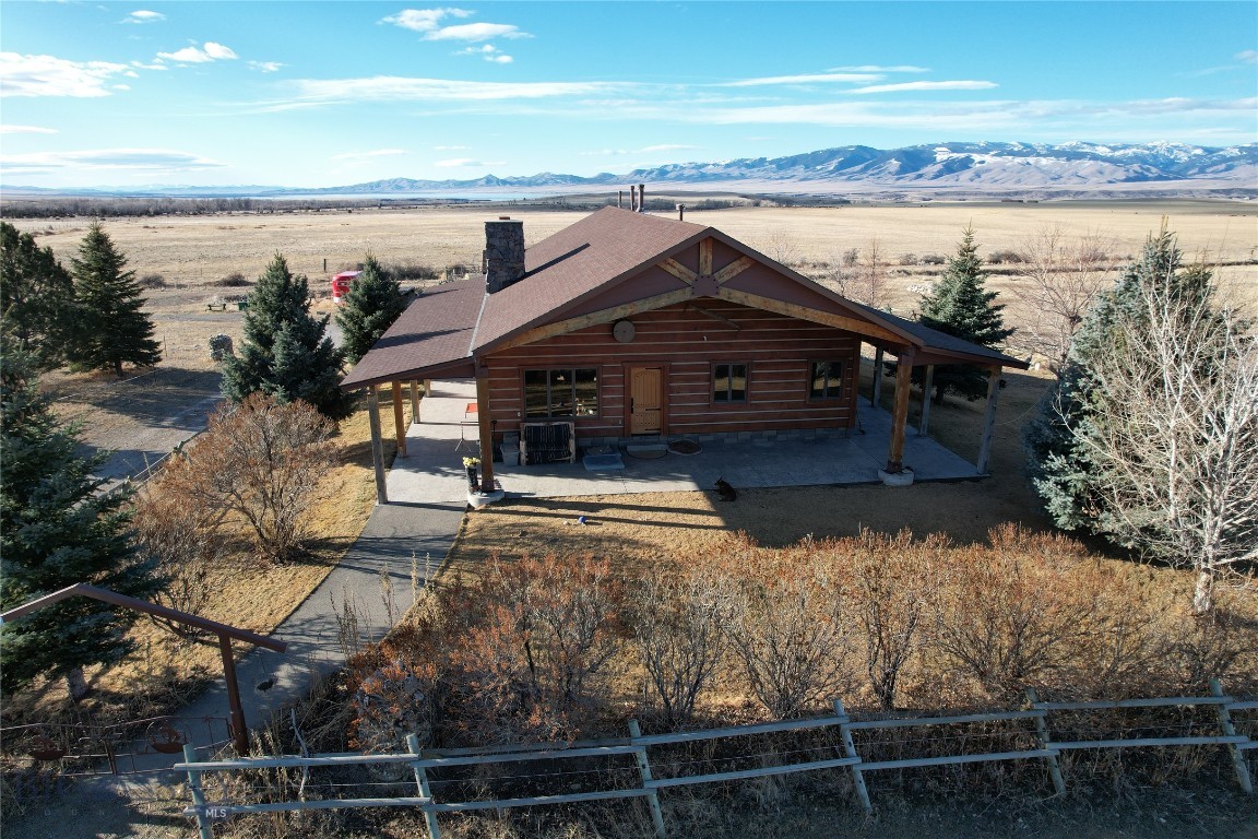 Welcome to The Elk Meadows Ranch located in Townsend, MT. Set on 60± acres of wide-open Montana ground, this one-of-a-kind property is where freedom, functionality, and frontier living all come together. This ranch sits in one of the best recreational areas that Montana has to offer. This custom-built Montana home features 2376+/- SQ/Ft of living space with handcrafted architectural timber beams, vaulted ceilings, and windows showcasing 360-degree views of the Elkhorn Mountains, Confederate Gulch, The Big Belts & Canyon Ferry Reservoir. This ranch has two spacious bedroom two-bathroom home features wood fireplace, another wood stove, kitchen, living room, dining room, washer and dryer room, unfinished basement, wrap-around deck, concrete patio overlooking the Elkhorn Mountains and Canyon Ferry Reservoir.  The property is unique in that it is on grid and also has solar backup system installed through the ranch. The shop is 7000SQ/FT steel framed with many amenities like industrial lighting, an overhead trolly crane. The shop also has a tack room for horse equipment and 1000SQ/Ft living quarters.  The quarters come with living room, bathroom, bedroom, full kitchen, and washer dryer. There is high end quality commercial type construction throughout the property. The builder and current owner operated a nationwide commercial construction company, and the quality is reflected at Elk Meadows. Other features of the ranch include 200' x 100? riding arena, chicken coup, hay shed, raised bed garden area, fully perimeter fenced and crossed fenced, full security system, private 100-yard rifle and pistol range, and a FAA licensed airstrip. The title is Elk Meadows FAA Designator 8MT4. Whether you’re flying in for the weekend, working the land, or simply escaping to peace and privacy, this property delivers the Montana dream—with fresh air, open skies, and opportunity in every direction. Call me to schedule your private tour.