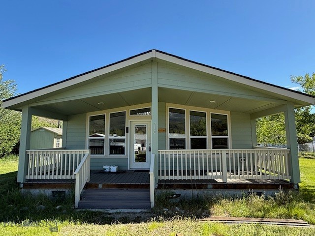 Welcome to this beautiful 3-bedroom, 2-bathroom modular home that perfectly blends comfort with stunning natural beauty. Relax on the covered front porch and listen to the breeze rustling through the mature birch trees, or take in the gorgeous, unobstructed views of Mt. Haggin from the front yard and the mountains above Cable Road out the back.

Inside, you will find a thoughtfully designed layout featuring a main floor laundry room conveniently located right off the kitchen. The private main suite serves as a true retreat, complete with awalk -in closet, an en suite bathroom featuring an oversized soaking tub, and a separate walk-in shower. Outside, a large storage shed provides ample space for all your extra gear and outdoor equipment. Don't miss the chance to make this scenic property your own!