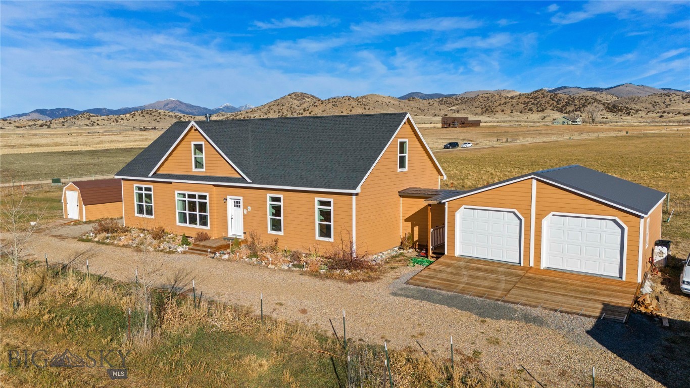 A rare opportunity to own a true Montana Ranchette where lifestyle, land, and breathtaking scenery converge. Located in the serene Ramshorn Mountain Estates, 30 Mountain View Road offers the perfect balance of productive agricultural acreage and elevated rural living with sweeping panoramic views of the Tobacco Root Mountains and Ruby Valley. This exceptional property features 14 acres of flat, usable ground, including 13.5 acres of established irrigated alfalfa capable of being replanted with wheat, horse hay, or alternative crops. It’s an ideal blend of beauty and income potential. Irrigation infrastructure conveys, including wheel and hand lines, an irrigation pump, and HOA-managed water rights. This thoughtfully designed 2019 home offers 4 bedrooms, 3 bathrooms, and 2,520 sq ft of comfortable living space with breathtaking views from every room, a beautifully appointed kitchen with a large island and stainless steel appliances and plenty of cabinets and counter space, a main-floor primary suite, and a spacious upper-level bedroom, office, and flex space that a buyer can put their finishing touches on. The yard features flower beds, apple trees, a fire pit, and garden space. Outdoor recreation surrounds you! Hunting, hiking, horseback riding, award-winning fly-fishing at Ruby River, a nationally celebrated blue-ribbon fishery, and Sheridan Lake, a renowned trophy trout fishery with access to public lands minutes away. Enjoy peaceful country living just 10 minutes from Sheridan’s new hospital, grocery and hardware stores, restaurants, brewery, schools, and small-town Montana charm. Whether you’re seeking a working mini-ranch, an equestrian or hay operation, or a private recreational retreat, this property delivers the authentic Montana ranchette lifestyle with room to grow, play, and live wide-open. Schedule a tour today!