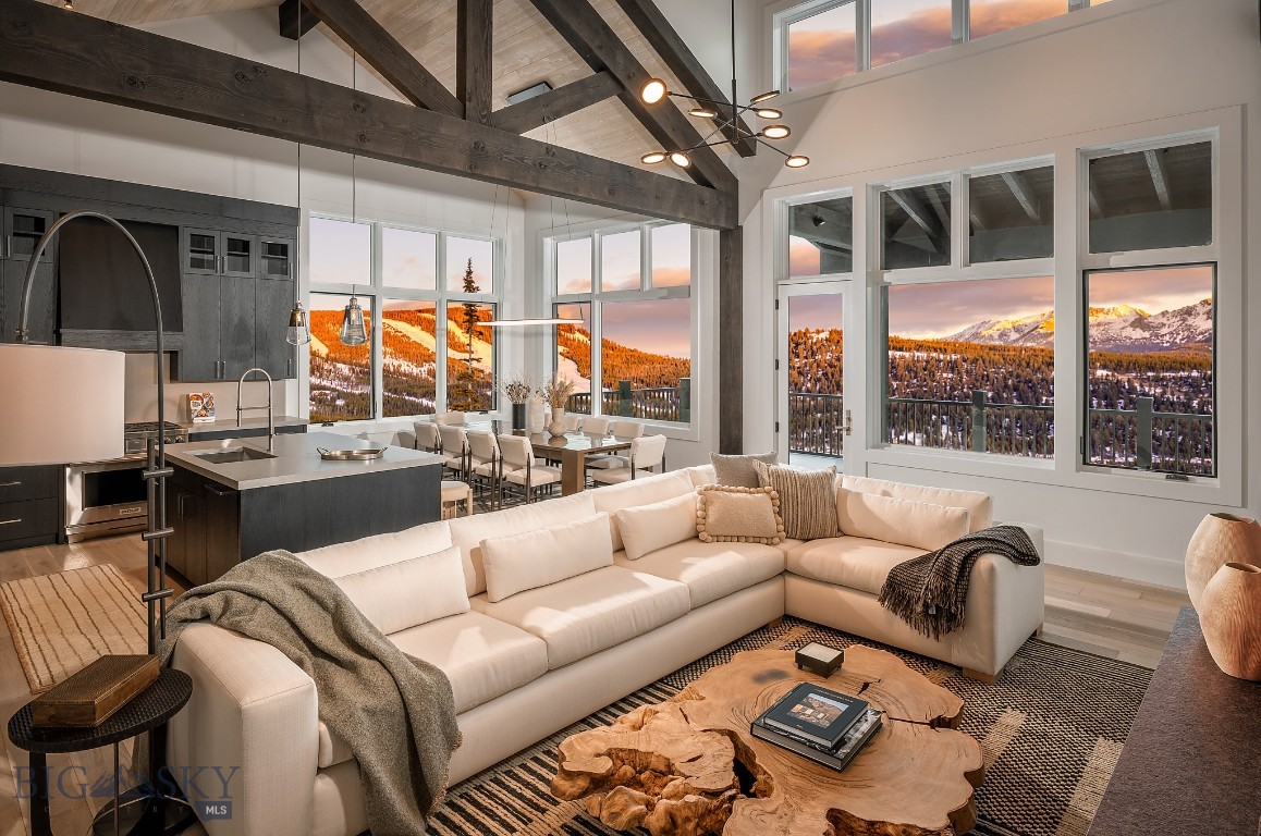 Welcome to the incredible Inspiration Point neighborhood that boasts the best views in Big Sky. Residence 11C, offered Unfurnished, is a 'cool' interior finish package—a contemporary mountain oasis that invites you to reconnect with nature. Situated in the exclusive Spanish Peaks Mountain Club, this exceptional home offers stunning views of Lone Mountain and the Spanish Peaks. This residence is a 5 bed, 6 bath, 4,146+/- sq. ft modern mountain retreat that seamlessly blends comfort and serenity. Boasting vaulted ceilings and a covered balcony and patio, an open concept kitchen with high-end appliances, walk-in closet off the primary bedroom, wet bar on the lower level, hot tub, and large flex room suited to let your imagination run with possibilities, this residence is one you'll want to visit. 
 
As a member within the Spanish Peaks community, you will enjoy unparalleled amenities, including alpine and Nordic skiing, snowshoeing, golfing, mountain biking, hiking, horseback riding, fly fishing, guided tours of the Greater Yellowstone area, spa treatments, fine dining, and more—providing endless opportunities for adventure. After an exhilarating day, relax in the member Clubhouse or at Montage Big Sky, or unwind by the wood burning fire or hot tub in your home. Nestled adjacent to the new 10-hole Par 3 course, Tom's 10, and the vast Spanish Peaks Mountain Club trail system, Residence 11C is a prime location for all recreation. Dive into scenic flow trails designed for thrilling mountain biking or explore hiking paths that take you to the serene Fish Camp or the stunning Inspiration Point Lookout Pavilion. Experience the perfect blend of luxury and outdoor adventure at Inspiration Point, where extraordinary moments create lasting memories.

Photos shown depict a similar residence in the same finish package; a furnishing package may be arranged upon Buyer request for an additional cost. A Signature Golf Membership or Social Membership is available and required for this property.