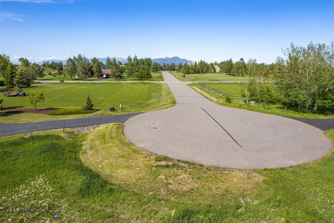 Prime 1.399 acre building lot in the sought after Hyalite Foothills subdivision. No county zoning. Enjoy captivating views of the Spanish Peaks, Bridgers  and surrounding mountains from this South of town location. A large open green space to the South makes this level lot feel even bigger along with views of rolling hills. Power and electricity are nearby and a well and septic are the buyer's responsibility. Hyalite reservoir and other recreational opportunities are nearby. 27 miles to Bridger Bowl and 43 miles to Big Sky. Come take a look at this beautiful property and start planning your dream home! Buyer to verify all information and is responsible for performing their own due diligence on all information related to the property.