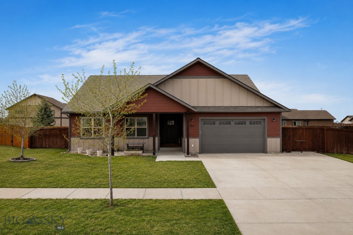 Single-level, large lot, and thoughtfully upgraded, this custom 3-bedroom, 2-bath home offers 1,980 sq ft of comfortable, open living on a spacious 10,010 sq ft lot. The well-designed floor plan centers on a welcoming living area with a striking black stone fireplace and wood trim throughout. The beautifully appointed kitchen features granite countertops, brand-new Samsung appliances (January 2024), including a gas stove, and a convenient closet pantry. The primary bedroom suite is a private retreat with a massive closet and a beautifully tiled shower with bench in the ensuite bath. Dual sinks in both baths add thoughtful convenience for busy mornings.  Enjoy the heated 2-car garage, additional concrete, and dedicated RV parking. Complete with newly installed AC, a fully fenced yard, raised bed garden area, and a firepit. Enjoy the enlarged front porch with tongue-and-groove ceiling — ideal for morning coffee or evening sunsets. This home blends everyday function with style and lifestyle. This sought-after neighborhood includes a desirable park.