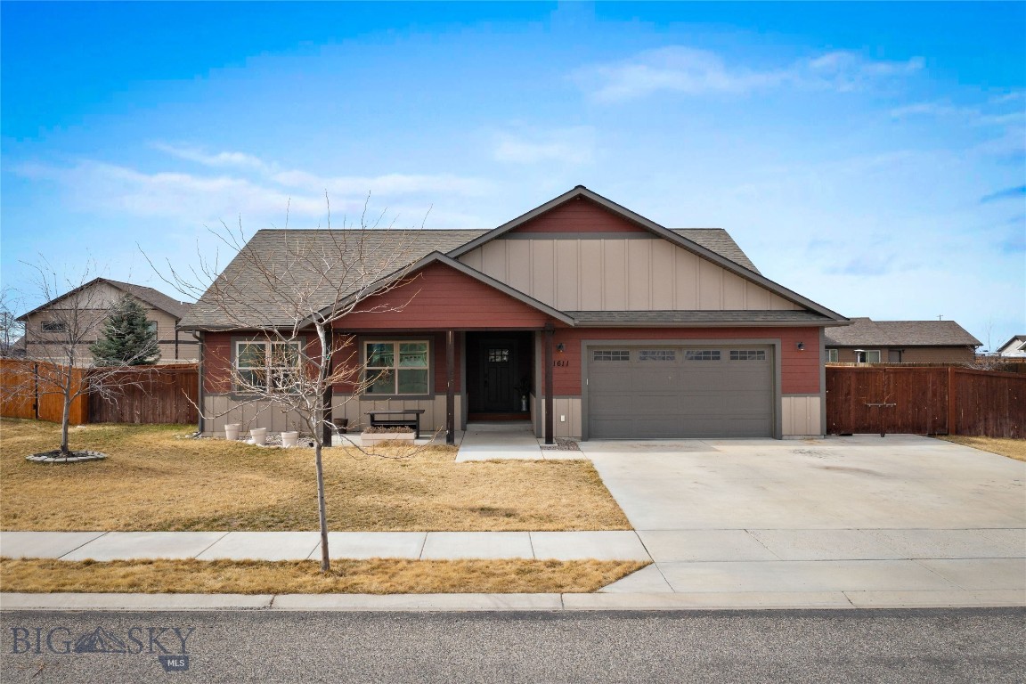 Single-level, large lot, and thoughtfully upgraded, this custom 3-bedroom, 2-bath home offers 1,980 sq ft of comfortable, open living on a spacious 10,010 sq ft lot. The well-designed floor plan centers on a welcoming living area with a striking black stone fireplace and wood trim throughout. The beautifully appointed kitchen features granite countertops, brand-new Samsung appliances (January 2024), including a gas stove, and a convenient closet pantry. The primary bedroom suite is a private retreat with a massive closet and a beautifully tiled shower with bench in the ensuite bath. Dual sinks in both baths add thoughtful convenience for busy mornings.  Enjoy the heated 2-car garage, additional concrete, and dedicated RV parking. Complete with newly installed AC, a fully fenced yard, raised bed garden area, and a firepit. Enjoy the enlarged front porch with tongue-and-groove ceiling — ideal for morning coffee or evening sunsets. This home blends everyday function with style and lifestyle. This sought-after neighborhood includes a desirable park.