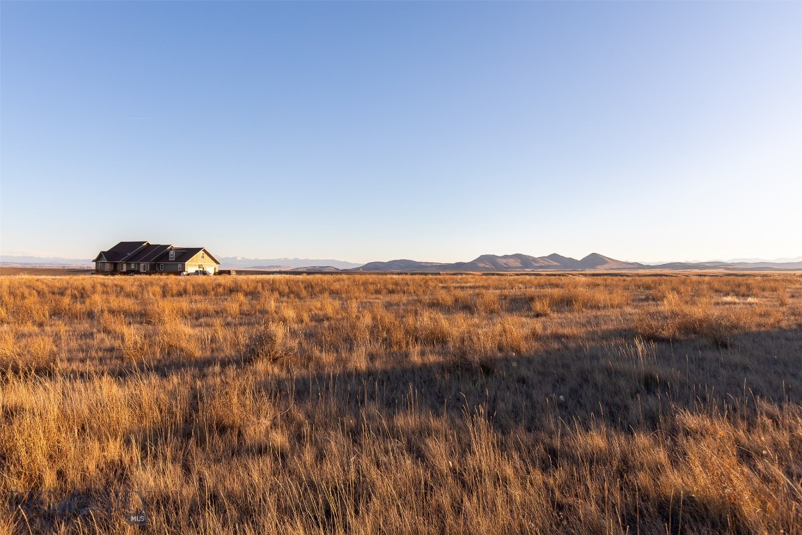 This is one of the best lots still available in Rolling Glen Ranch! Located at the southern edge
of the development, it has unobstructed views for miles. Nearly all five acres are
flat, with a gentle slope in the far southwestern corner. Excellent sledding hills for
the kids are literally a stone’s throw away. Deer and antelope regularly graze in the
area. It’s only a handful of miles from Three Forks, and offers a peaceful and quiet
setting. Don't miss your opportunity to build your dream home on this incredible lot!