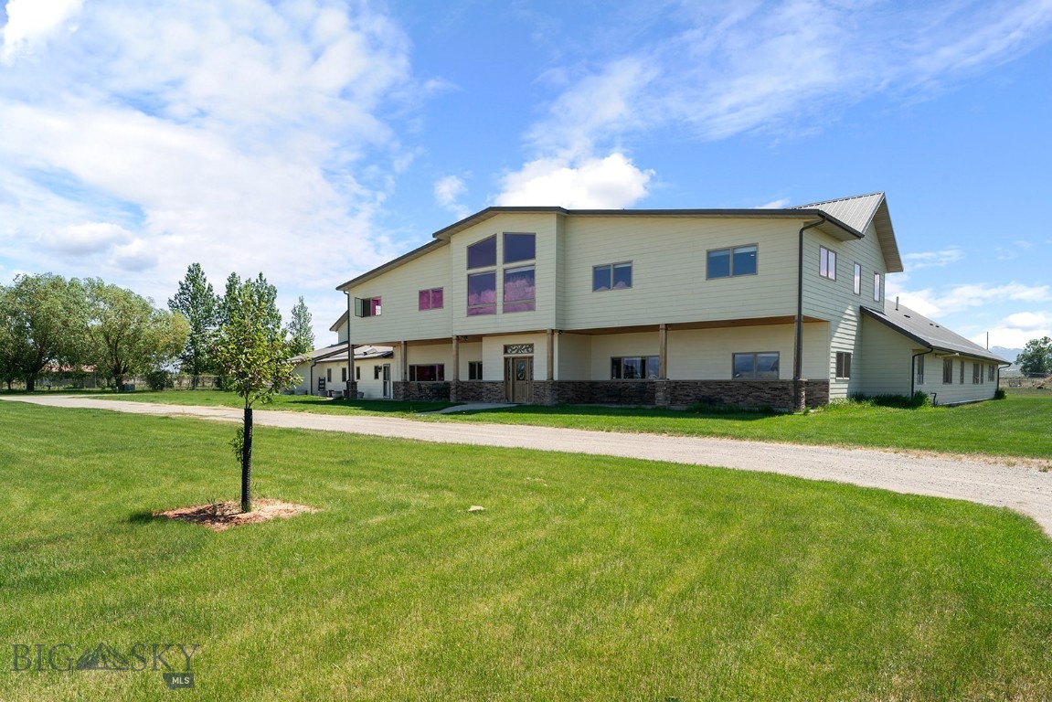 Perfect multi-generational, move-in ready home offers tons of natural light and mountain views across the valley on over 4 acres. The expansive floorplan has room for everyone to have their own space and large living areas when you want to be together. Enter into the thoughtful spaces that include a formal living room with impressive stacked stone, gas fireplace, then a massive great room perfect for entertaining with large cook's kitchen including a 6-burner gas range, griddle, and three ovens for the chef in the family. A large primary suite includes gas fireplace and ensuite, with steam shower and soaking tub. Two additional ensuite bedrooms on main floor. Upstairs you'll find a living area with big mountain views plus a game room, four bedrooms and two full baths. The upstairs is accessible with electronic stair chair. Tons of extras including multi-zone radiant floor heating throughout, hot tub room, and gym area. Huge multi-car garage, heated & insulated, with a shop area for all your projects and toys. Above the garage is over 2000 sqft of unfinished space for your own vision. Large level lot with underground sprinklers and views of the Big Belts. Quick access to Helena and shopping. For complete list of this expansive home's extras, contact your agent.