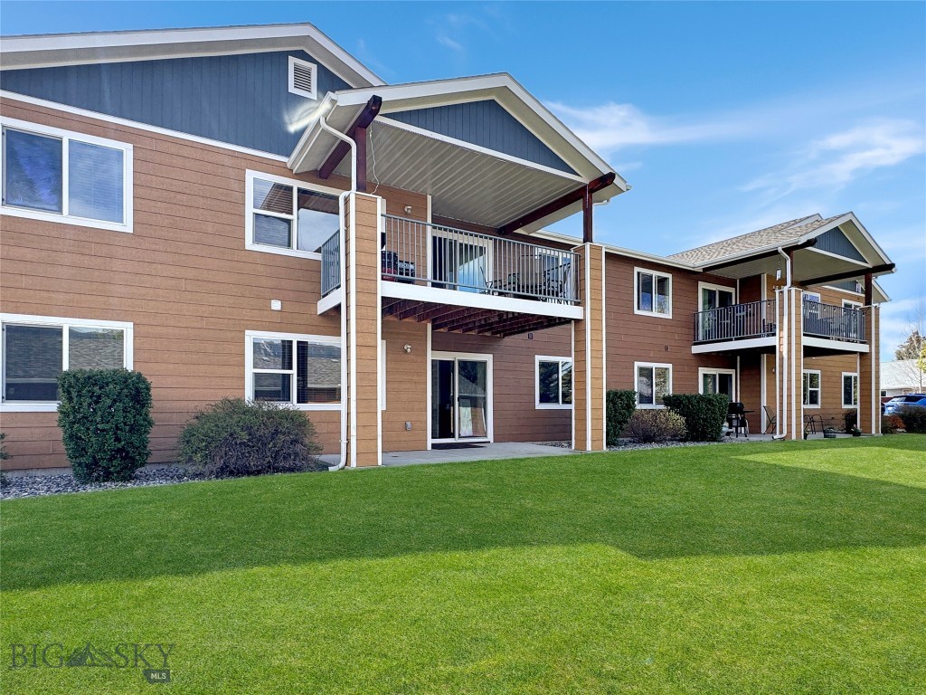 Very well maintained and spacious ground floor condo offering comfortable main floor living with an inviting open concept layout connecting the living, dining, and kitchen areas.  Newer flooring and paint throughout provide a fresh, updated feel.  The spacious primary suite features a walk-in closet and private bathroom, while the additional bedroom and full bath provide great flexibility for guests or office space.  The kitchen includes stainless steel appliances, pantry storage, and a convenient built in desk area, and a seating peninsula perfect for additional dining and entertaining space.  You'll also appreciate the large main floor laundry room and patio door leading to a private covered porch overlooking the beautifully maintained lawn. This space is perfect for relaxing and enjoying the outdoors. Private oversized one-car garage and parking area.