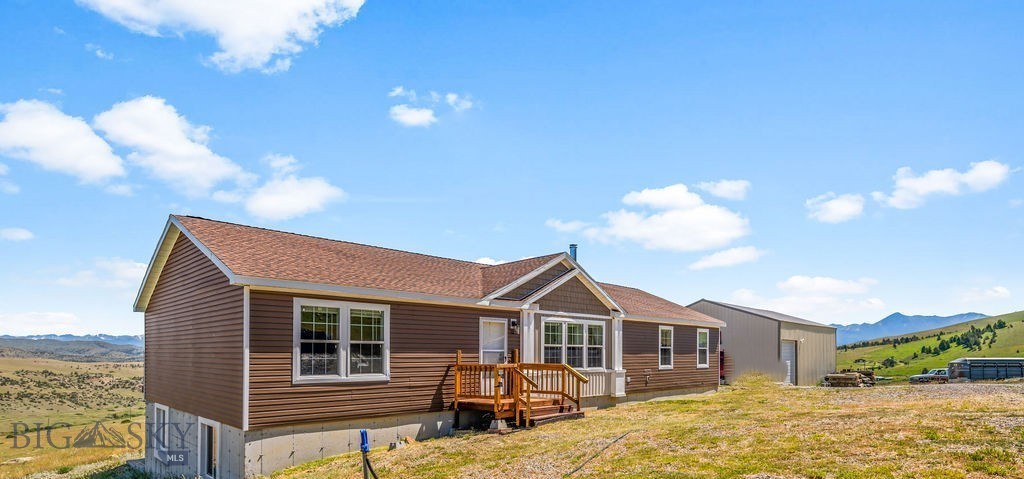 Country Living with Big Montana Views on Horse-Friendly Ground! 

Situated in the scenic surroundings of Livingston, 14 Pony Road offers a well-kept rural retreat where horses, views, and comfortable living come together in a quiet, usable landscape. 

The home is spacious and thoughtfully laid out for everyday living, with a main level that feels warm and welcoming and a lower level designed for flexibility—perfect for guests, hobbies, or a relaxed second living space. The floor plan offers comfortable gathering areas, generous bedrooms, and practical storage that keeps country living organized and easy.

Outdoor living is a standout here, highlighted by a large deck with incredible views that stretches the living experience into the open air. It’s an effortless place to linger—whether you’re sipping morning coffee as light pours over the pasture or winding down while the mountains catch the last burn of sunset. Surrounding you, sweeping mountain vistas and the wide-open valley create a living backdrop that shifts with every hour, making the outdoors feel like an extension of the home itself. 

Designed with function in mind, and including a A 30 x 40 outbuilding can be used as a garage or a shop, the acreage is well suited for horses, offering room to ride, graze, and work the land with confidence. The property has been cared for and maintained with a steady hand, creating a sense of order that pairs naturally with its rural setting. Corrals, loafing shed, shop all included in the home sale.

A true blend of livability and land, 14 Pony Lane is the kind of property that supports both daily routines and long, quiet moments—grounded, usable, and distinctly Montana in feel.