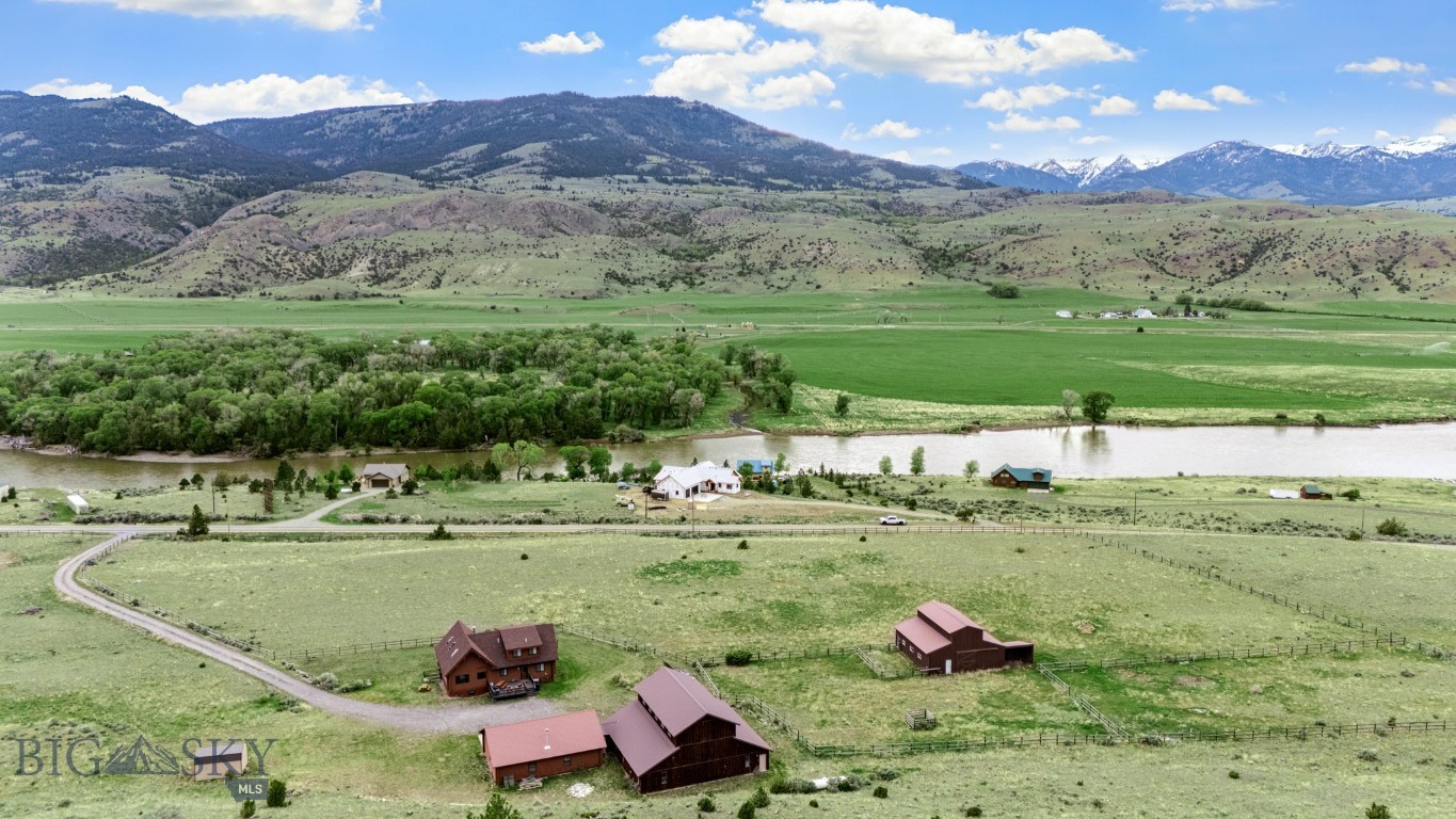 Experience the ultimate Montana retreat with this stunning custom log home in Emigrant, Montana. Nestled in the majestic beauty of Paradise Valley and bordered by vast expanses of State and U.S. Forest Service land, this property offers unmatched access to Montana’s wild beauty. Located minutes from Yellowstone National Park, you’ll enjoy incredible wildlife sightings, from elk herds, big horn sheep, and deer to occasional moose and bears. Bird enthusiasts will be captivated by the daily visits of osprey, eagles, herons, and more. For fishing enthusiasts, the Yellowstone River, a world-class trout fishing destination, is right at your doorstep with a nearby public boat launch. And when you’re ready to unwind, you’re just minutes from the luxury of Chico Hot Springs Resort and Sage Lodge, offering fine dining, day spas, and hot springs to relax and rejuvenate. This recently renovated 6-bedroom, 5-bathroom home is designed for both comfort and versatility. With two kitchens, two living areas, and two laundry rooms, plus a separate entrance to the lower level, it’s ideal for hosting large families, adventure groups, or corporate retreats. Currently a successful vacation rental with proven rental history and easy enough for you to continue, or make it a family compound. Additionally, there’s a 3,100-square-foot unfinished guest house for expansion and a 30x40 heated, 3-stall garage for all your outdoor gear. Horse lovers will appreciate the barn and fenced pasture areas already in place. From fishing and hiking to relaxing at nearby hot springs, this property is a base camp for year-round adventure. Whether you’re seeking a private sanctuary, a luxury rental investment, or a bit of both, this extraordinary property delivers the perfect Montana lifestyle. Make it yours today!