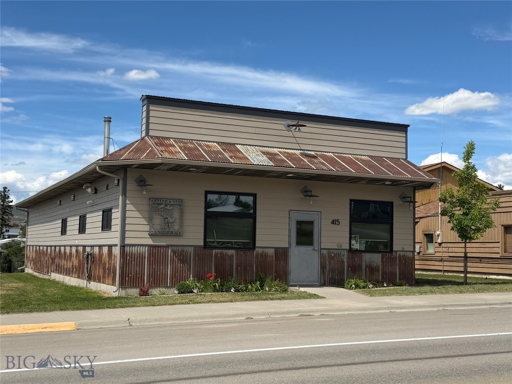 This is your chance to own gorgeous property on Main Street in White Sulphur Springs.  The building was fully renovated in 2019 and transformed into a stunning art gallery.  The total of 2,100 square feet is divided into two spaces for a showroom and workshop area atmosphere.  There is a propane forced air furnace, central air conditioning, wood stove, and the concrete slab at the rear of the building is all plumbed for radiant floor heat.  The property is 2 city lots totaling 7,200 square feet.  Each lot is 40' x 90' giving you 80' of Main Street frontage.  This building is a blank canvas awaiting your imagination and endeavours. The wide open interior space leaves opportunity to turn the space into what works best for you.