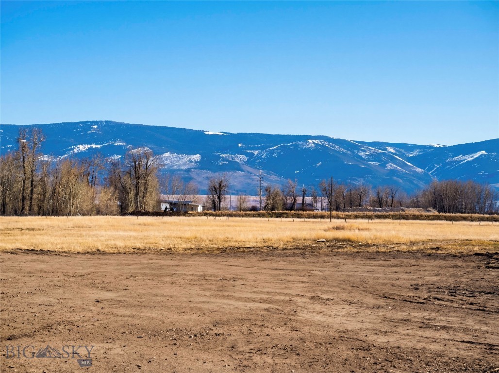 Discover the perfect canvas for your dream home on Bozeman’s coveted west side! This picturesque half-acre parcel offers sweeping panoramic views of the Gallatin, Madison, and Bridger mountain ranges, creating a breathtaking backdrop that showcases Montana’s natural beauty in every season. Whether you’re a builder looking for an excellent spec home opportunity or a buyer ready to design and build a custom residence, this lot provides the ideal setting to bring your vision to life. With ample space and an exceptional vantage point, the property allows for a thoughtfully designed home that maximizes the surrounding scenery and Montana lifestyle. Imagine expansive windows, outdoor living spaces, and a layout tailored to capture the incredible mountain views that define the Gallatin Valley. Conveniently located just minutes from Bozeman’s vibrant downtown, you’ll enjoy easy access to shopping, dining, and entertainment. Outdoor enthusiasts will appreciate the proximity to world-class recreation in every direction, including Big Sky’s renowned skiing and snowboarding in the winter and endless hiking, fishing, and mountain biking in the warmer months. Whether you’re planning a custom home or a builder searching for the perfect next project, this exceptional parcel presents a rare opportunity to create something truly special in one of Bozeman’s most desirable locations.