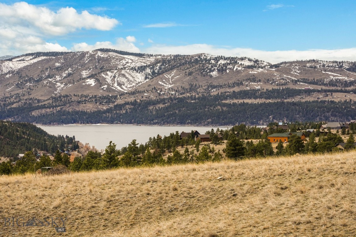 Welcome to 8545 Eagle View Road in coveted Canyon Ferry Crossing subdivision! The 5 acre property is seeking new ownership where your Montana dream home could be built. Perched on top of a plateau is an ideal home building site. From here, the lot captures exceptional views of surrounding mountain ranges, Magpie Gulch and Canyon Ferry Lake. The building site is truly remarkable and makes you feel like you are on top of the world with views for miles! The lot is easily accessible year round by a dirt road and is only minutes away from State Land, Canyon Ferry Lake and endless outdoor recreational opportunities. Not only is the lot situated close to outdoor adventures, but the state capital, Helena, is approximately a 30 minute drive where you have access to grocery stores, restaurants, schools, shopping and parks. Come tour today while still available!