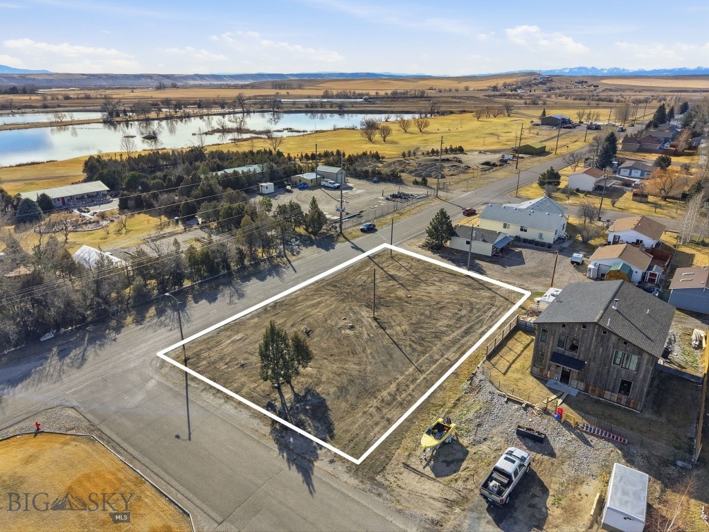 Excellent development opportunity in the charming town of Three Forks. These two lots include city-approved engineered plans for a triplex, offering a strong opportunity for builders or investors looking for a project that’s ready to move forward. The property may also be developed as two single-family homes, providing flexible building options. *CITY WATER & SEWER

The triplex plans are thoughtfully designed to overlook the nearby golf course with views of the Bridger Mountains, creating an attractive setting for future residents. Enjoy close proximity to a pond and walking trails, along with easy access to downtown Three Forks, the frontage road, and Interstate 90 for convenient travel.

This property combines location, views, and development potential—a great opportunity for builders in a growing Montana community.